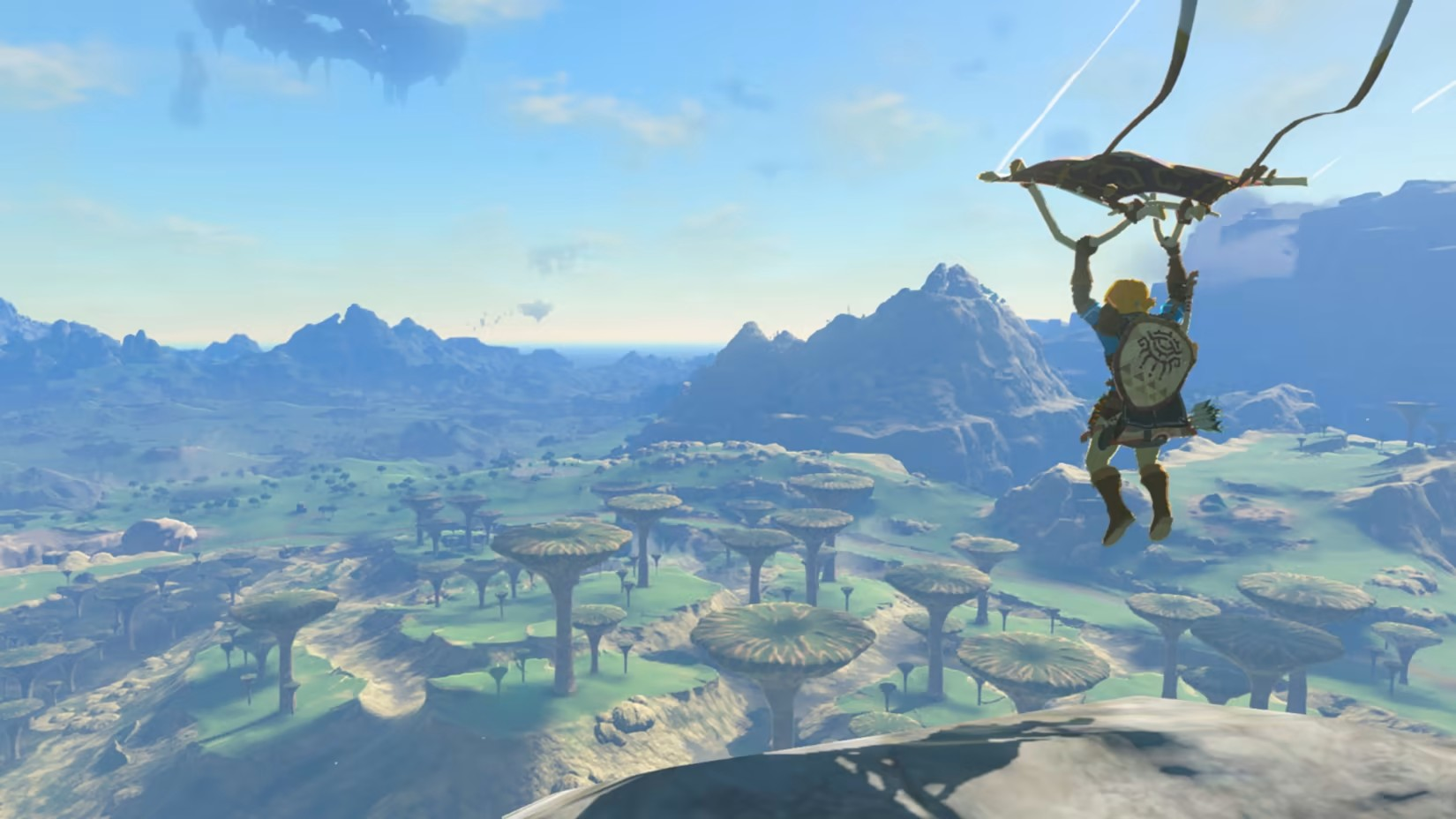 Link paragliding over Hyrule in The Legend of Zelda: Tears of the Kingdom.