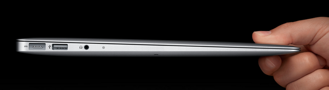 Macbook Air, showing the thin side profile view.