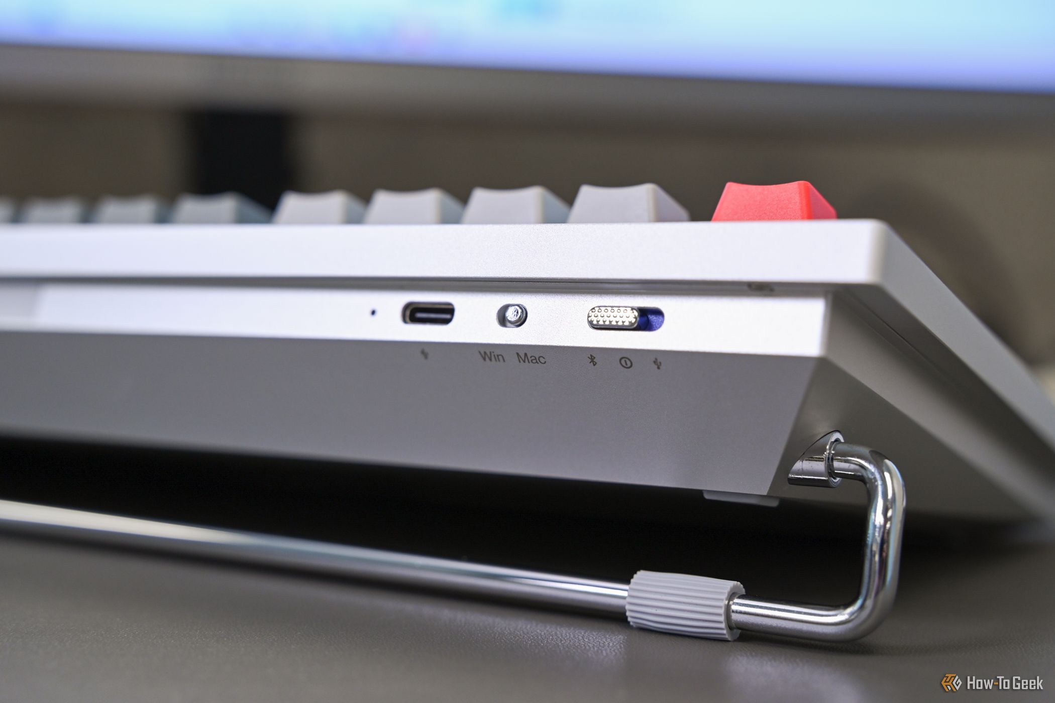 Showing the back of the OnePlus Keyboard 81 Pro with connection switch