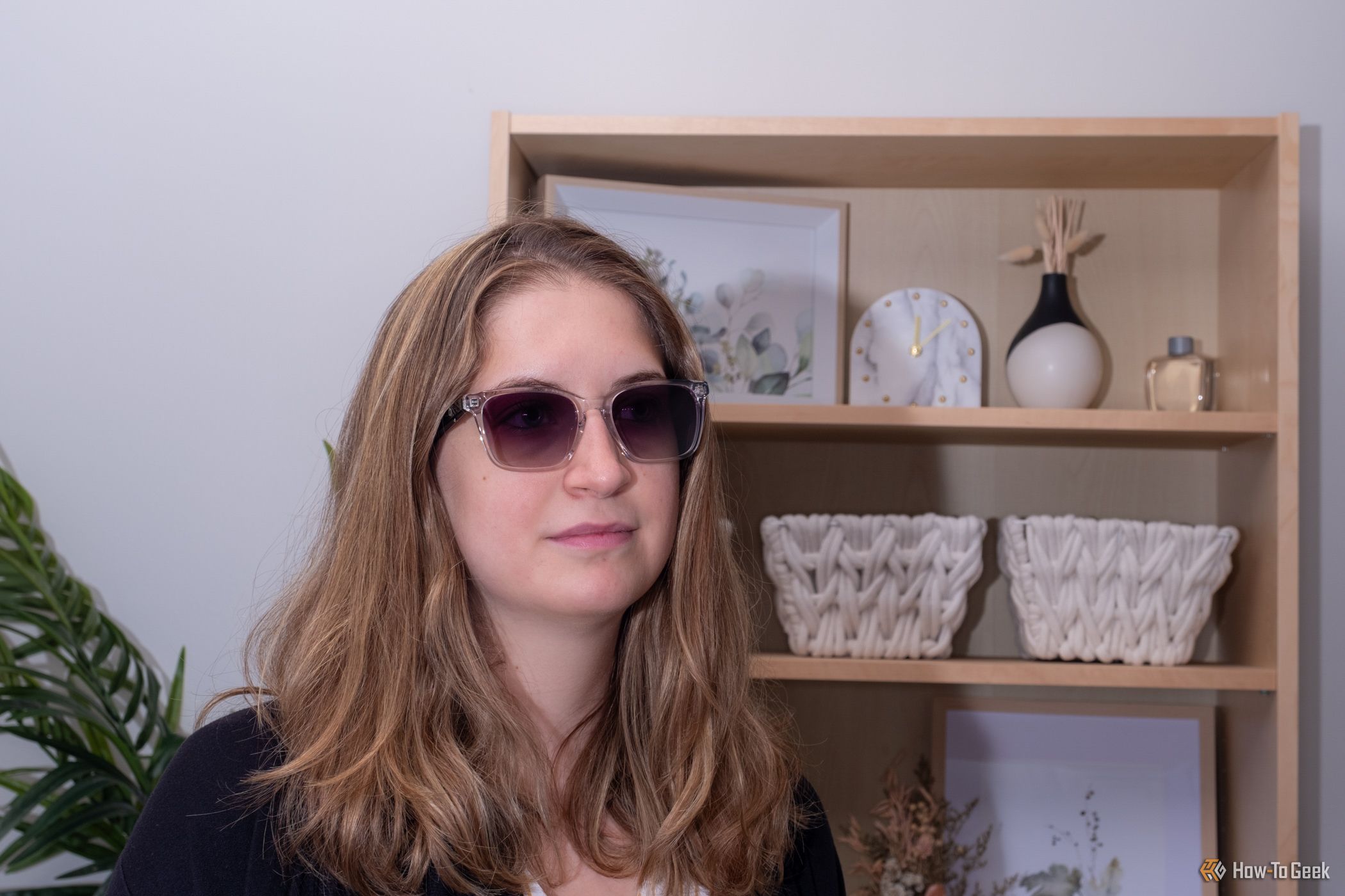 Person wearing the Lucyd Lyte sunglasses inside