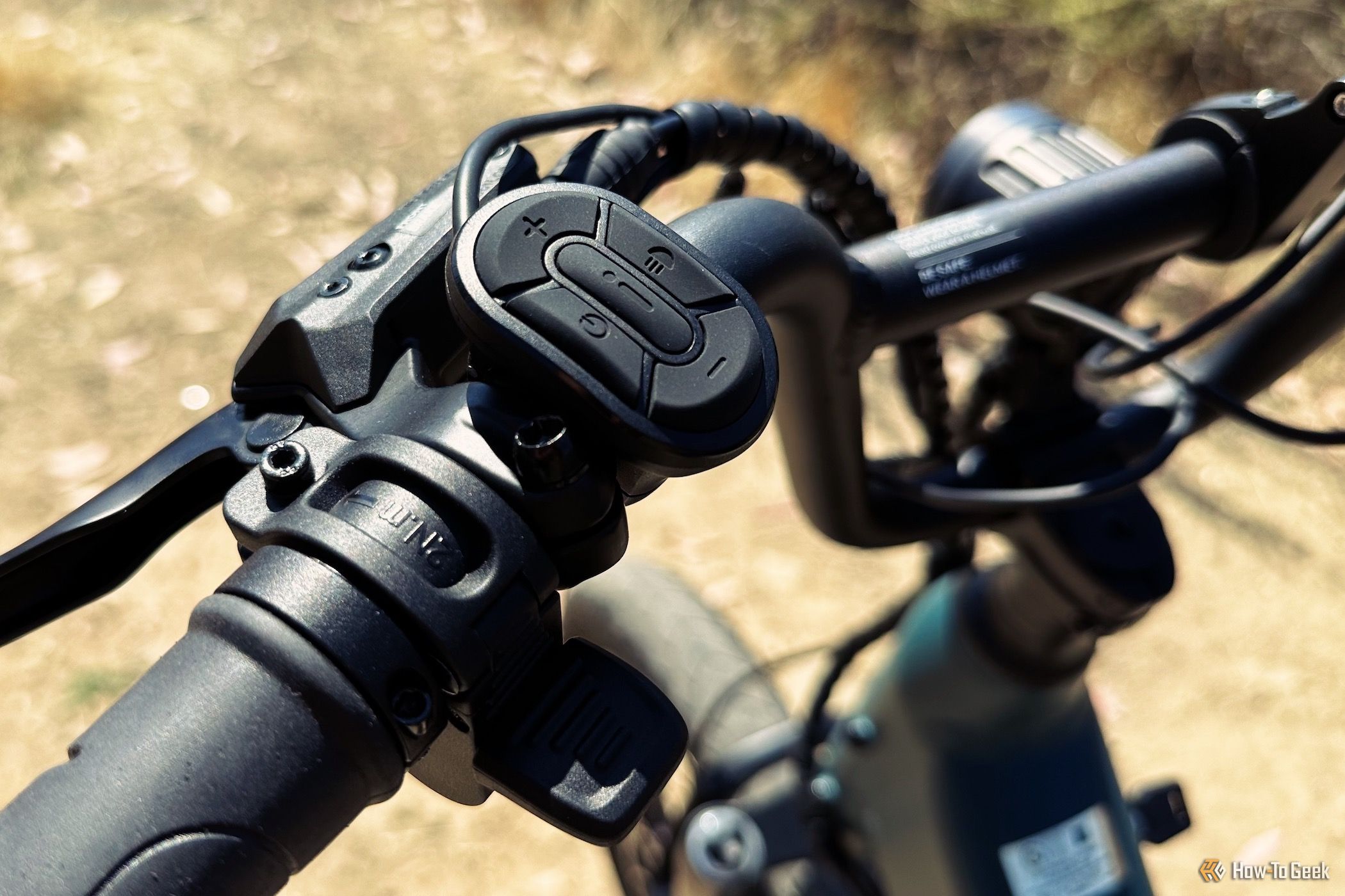 Showing the Velotric Go 1 control buttons for power and lighting