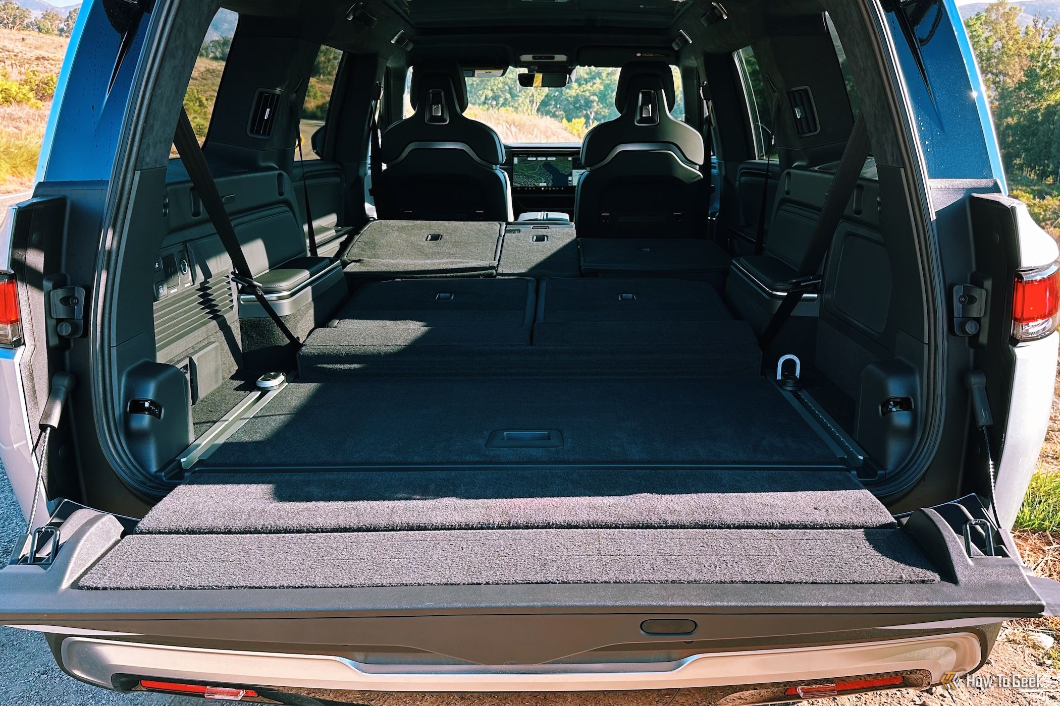 Looking into the back of the Rivian R1S with all the seats down