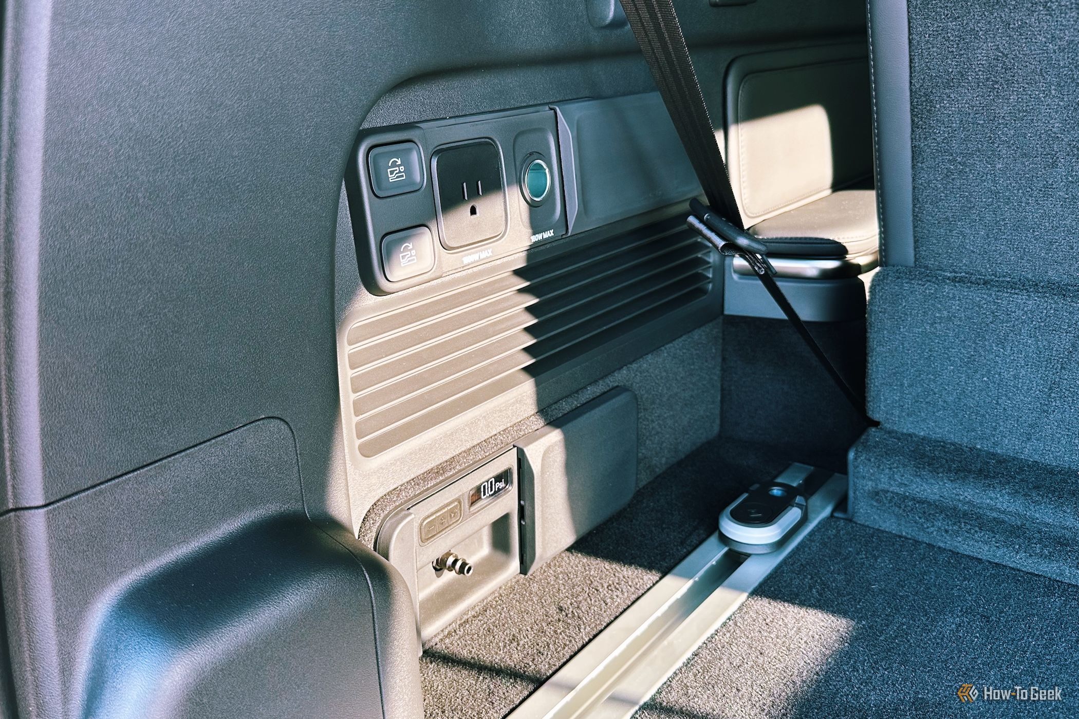 Rivian R1S has power and an air compressor in the trunk area