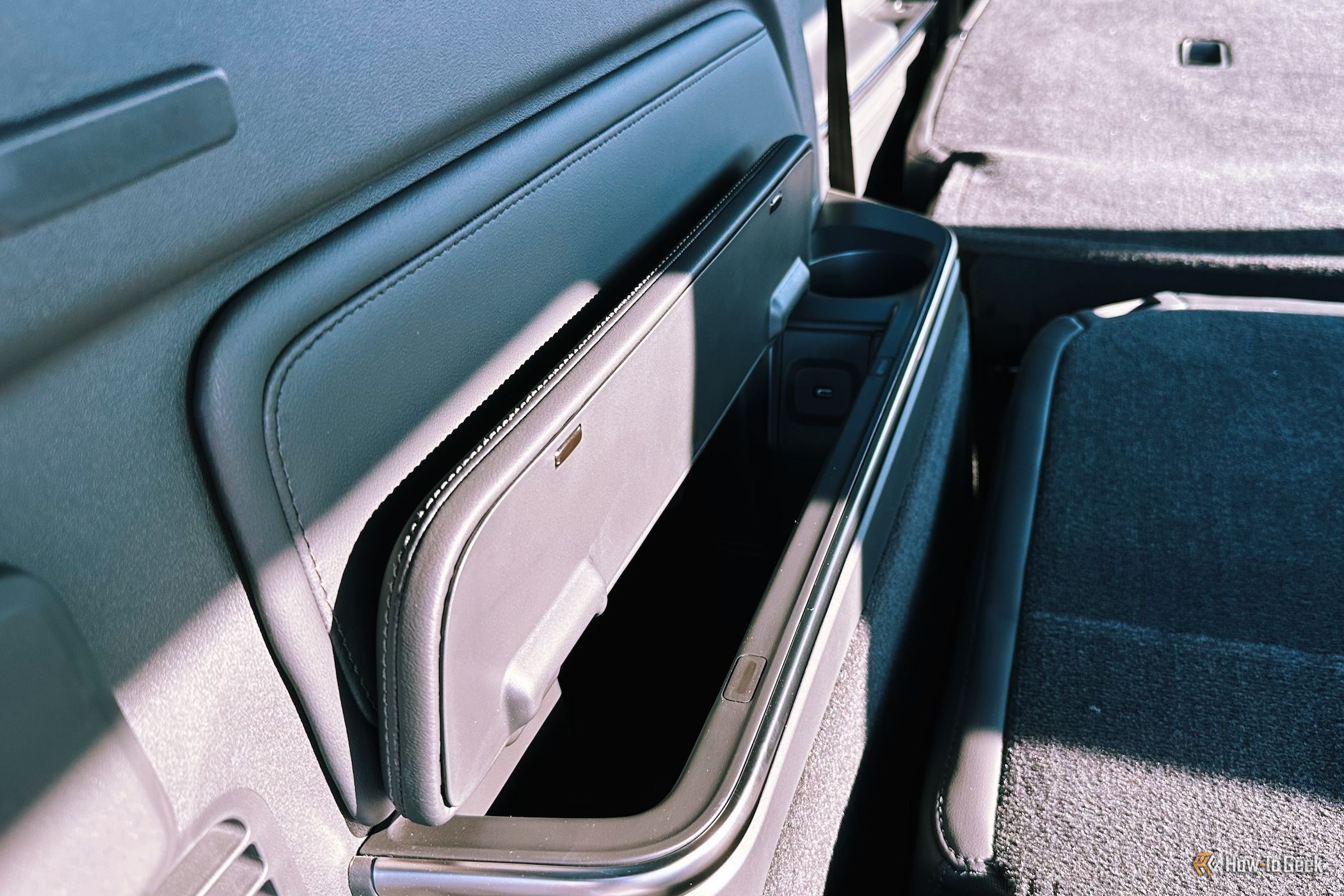 Rivian R1S third-row seats have storage and a USB-C charging port in the armrests