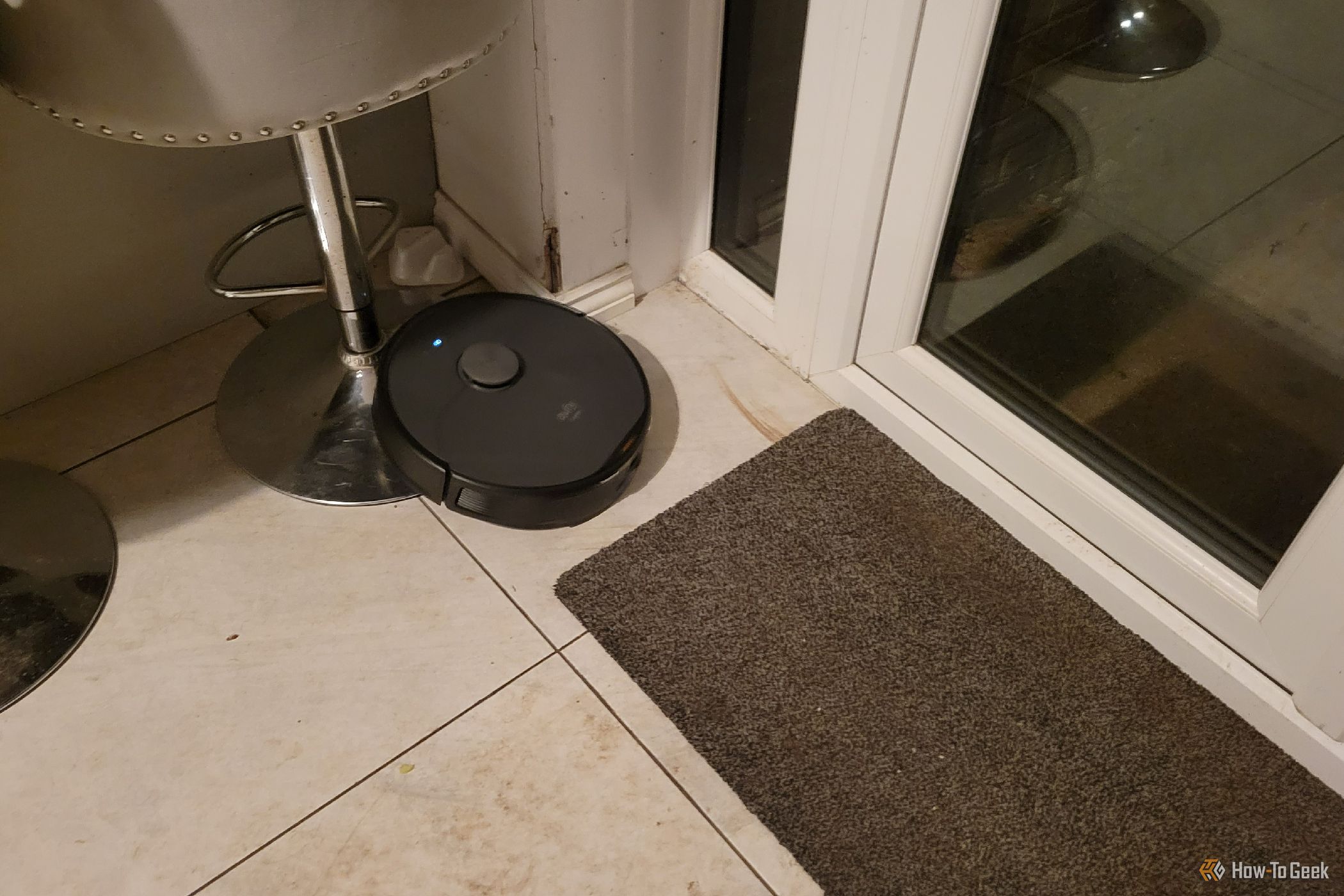 Eufy X8 Pro cleaning a stool base