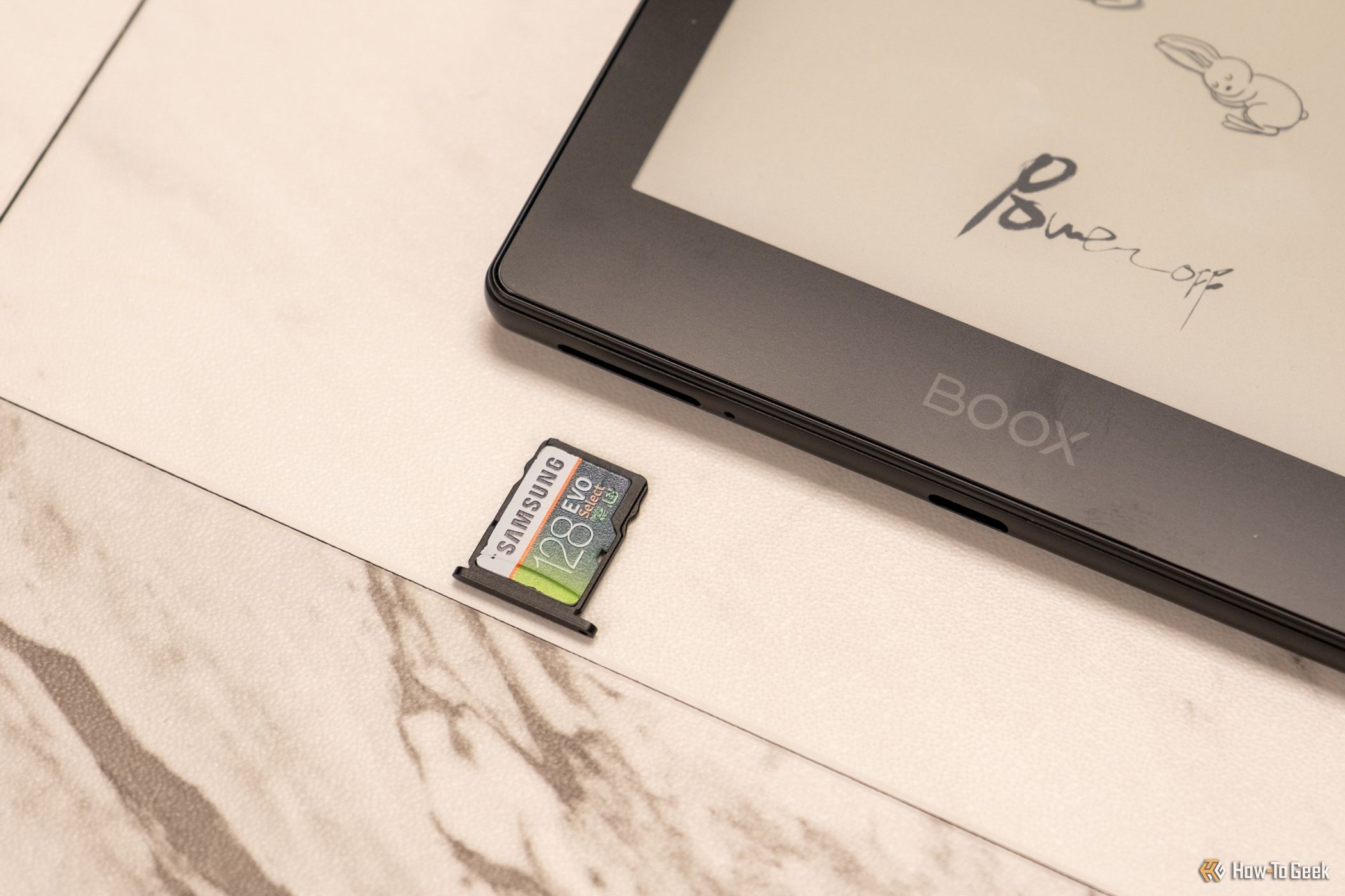 Inserting a microSD card in the Boox Poke 5.