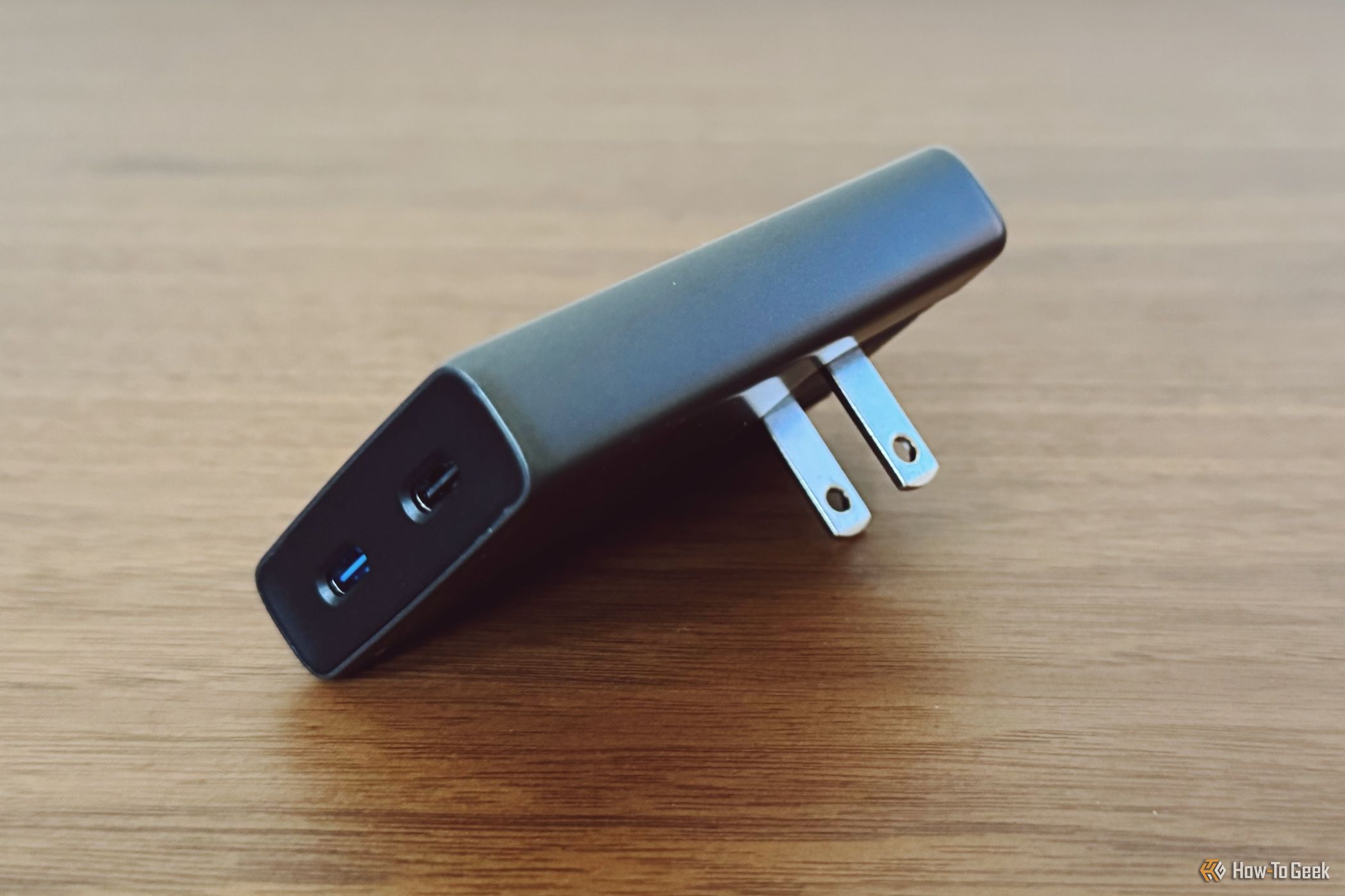 Nomad 65W adapter with prongs extended-1