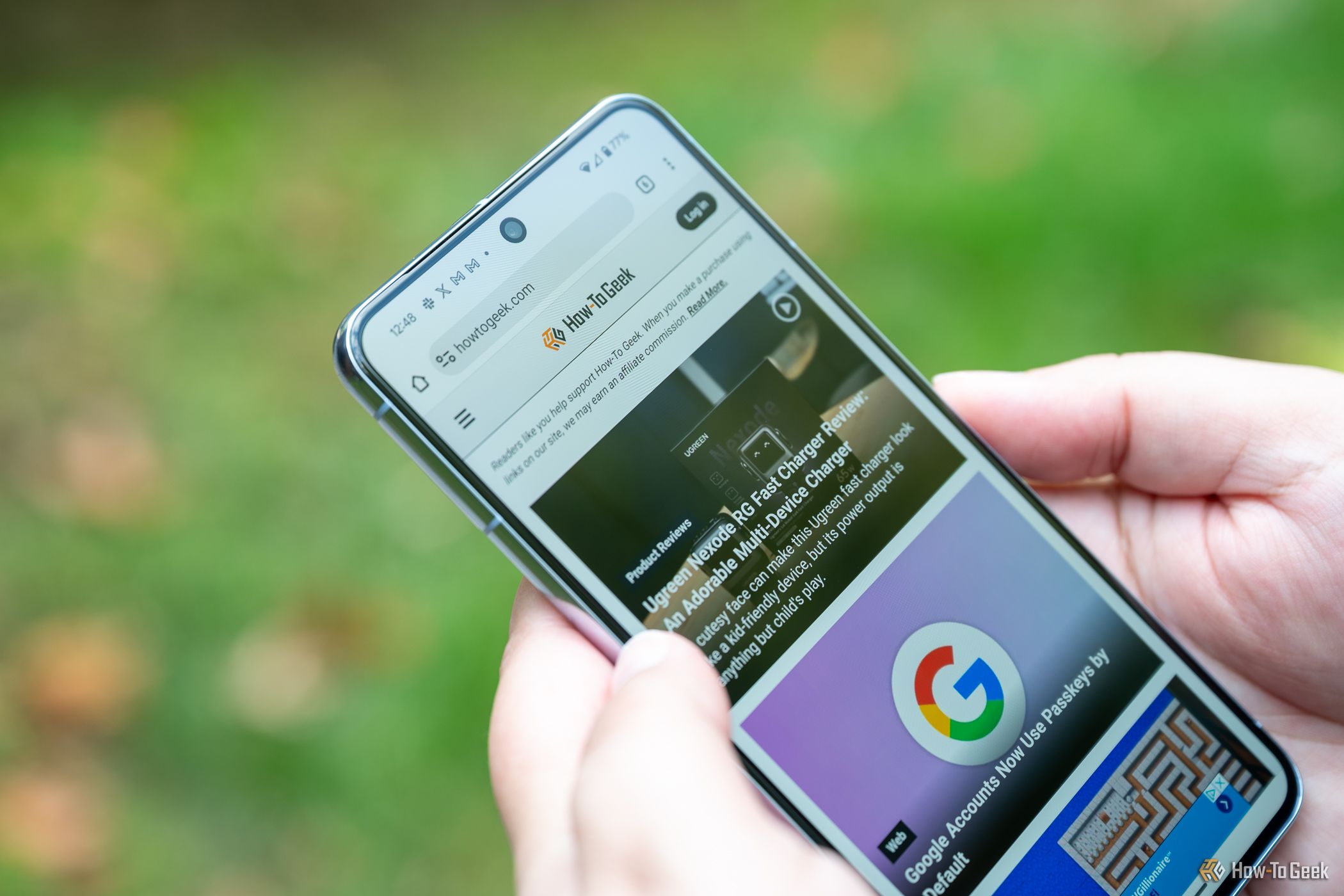 Person using a web browser on the Google Pixel 8 Pro