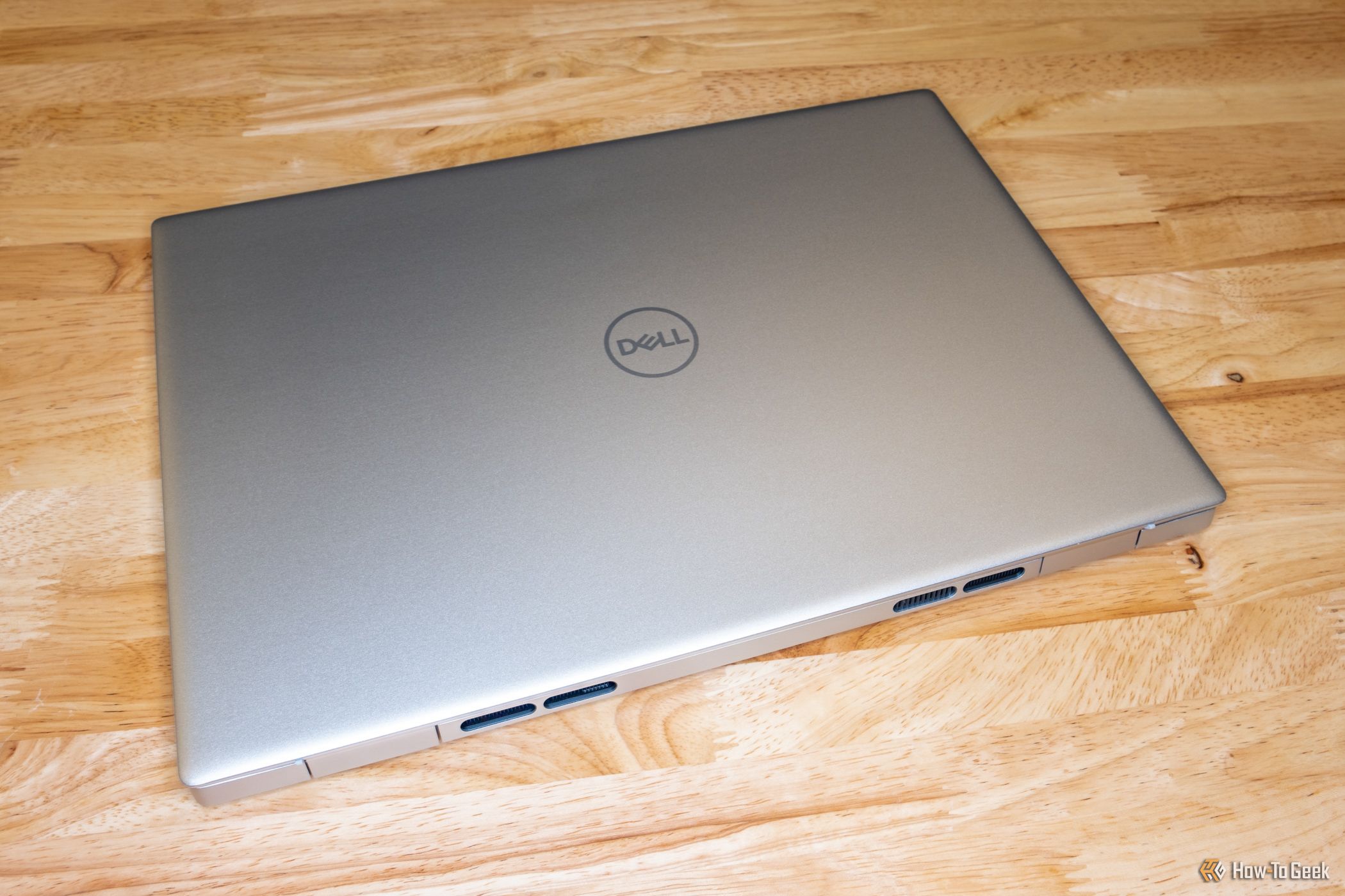A closed Dell Inspiron 16 Plus 7630 on a table.