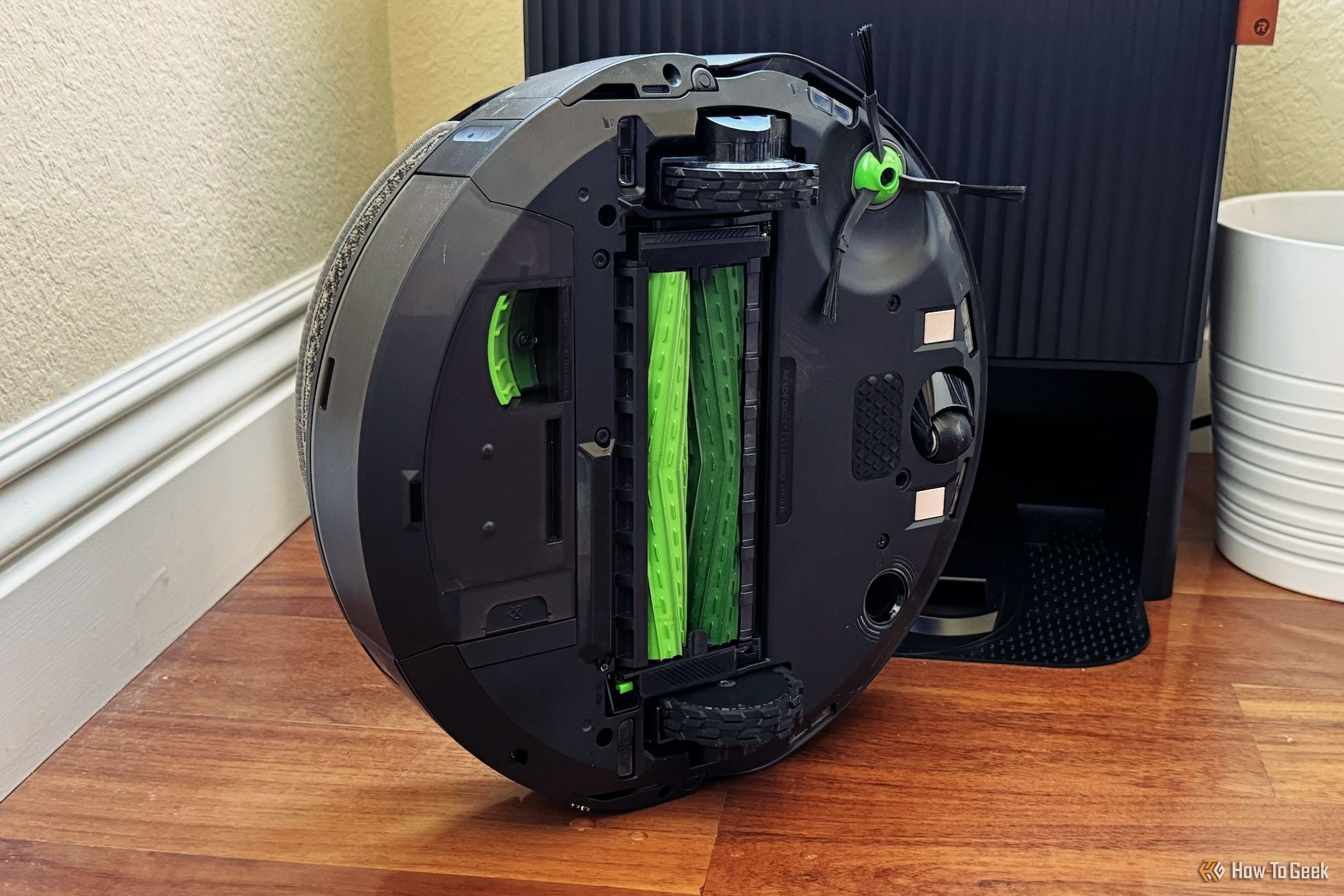 The Roomba Combo j9+ flipped over showing the underneath