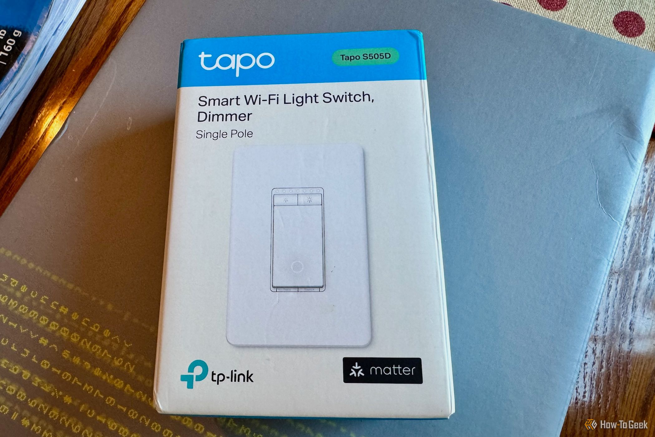 A TP-Link Tap S505D in a box. 