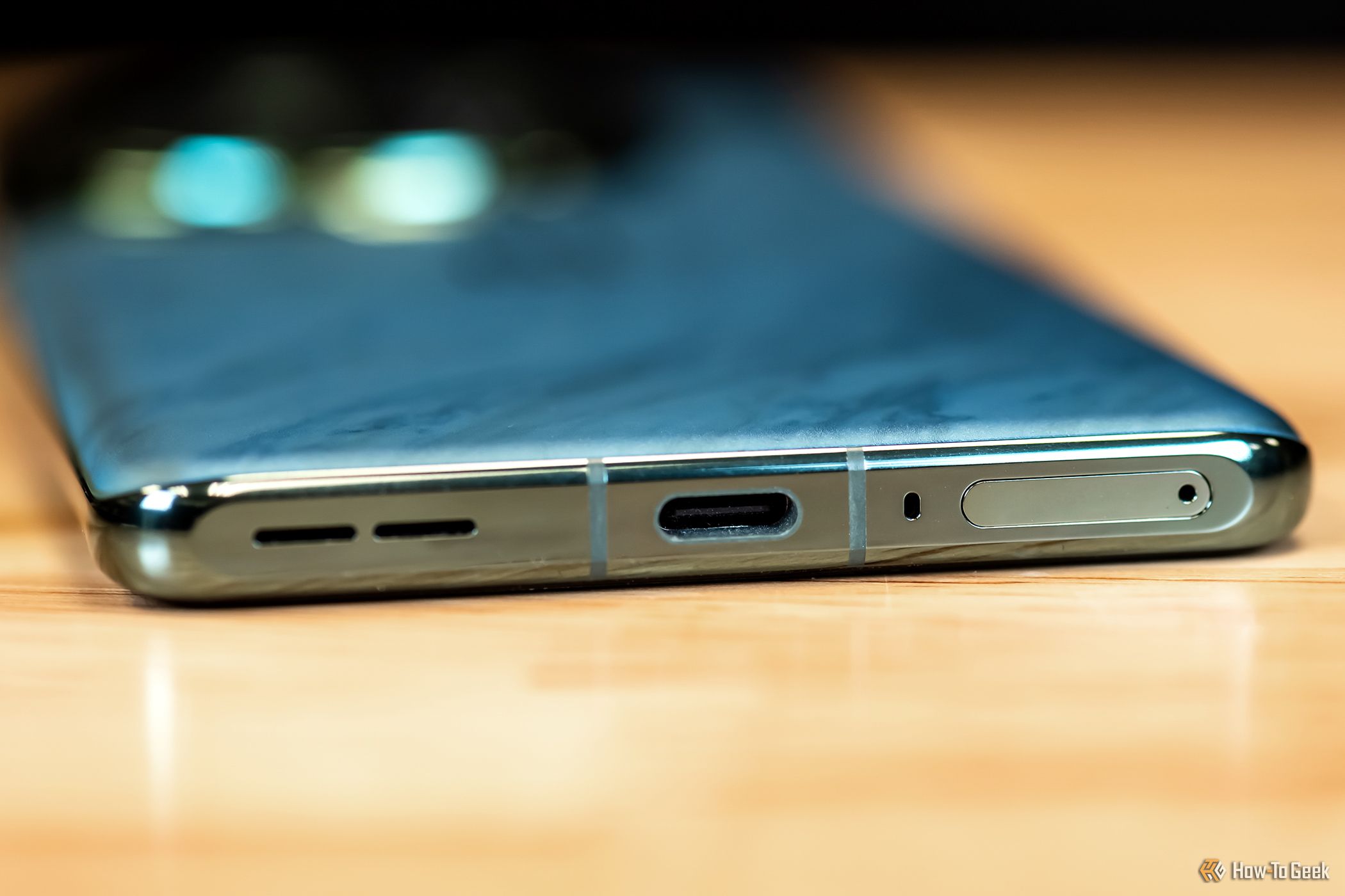OnePlus 12 Charging Port and SIM slot on the bottom