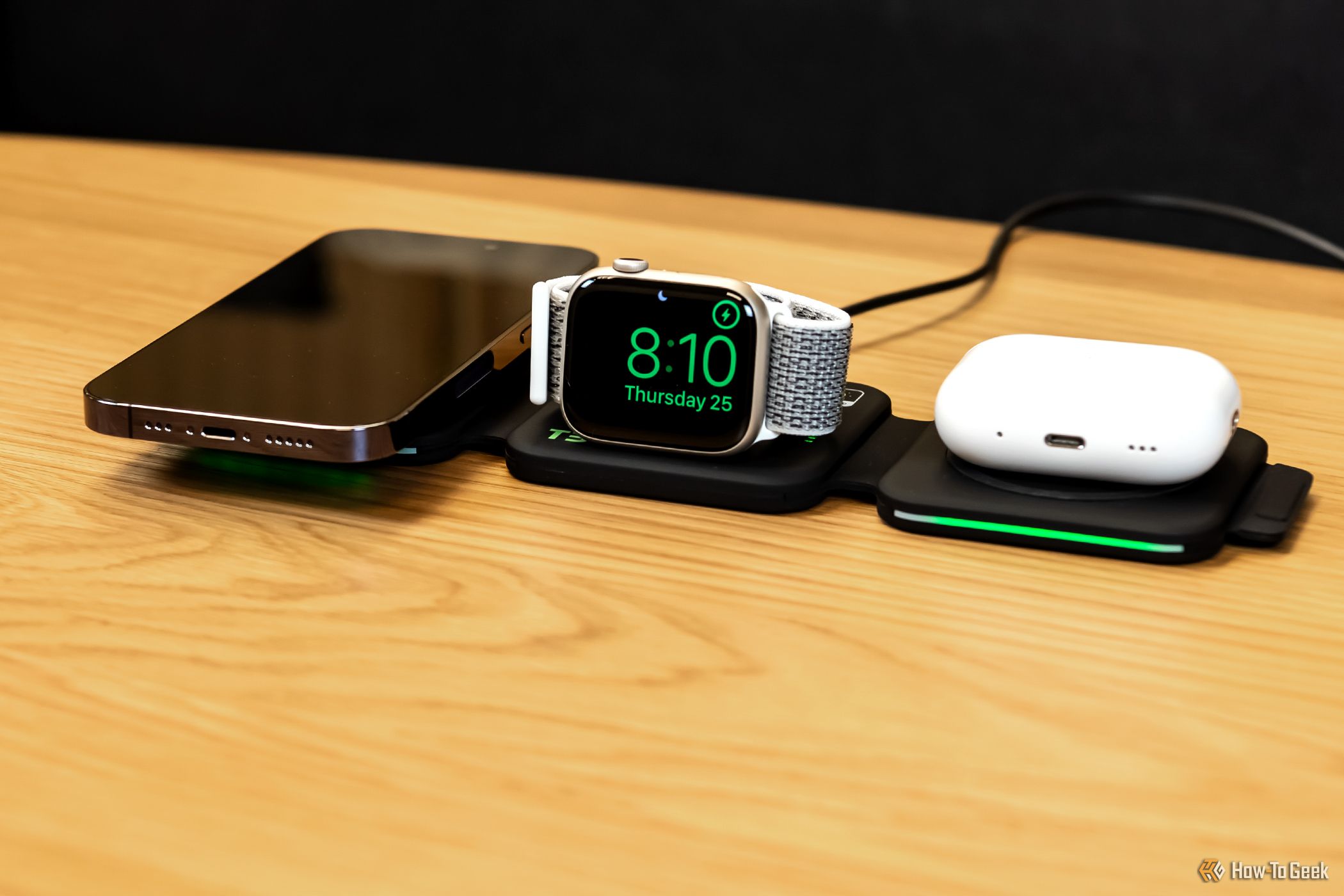The Infinacore T3 Wireless Charging Station charging an iPhone, Apple Watch, and AirPods