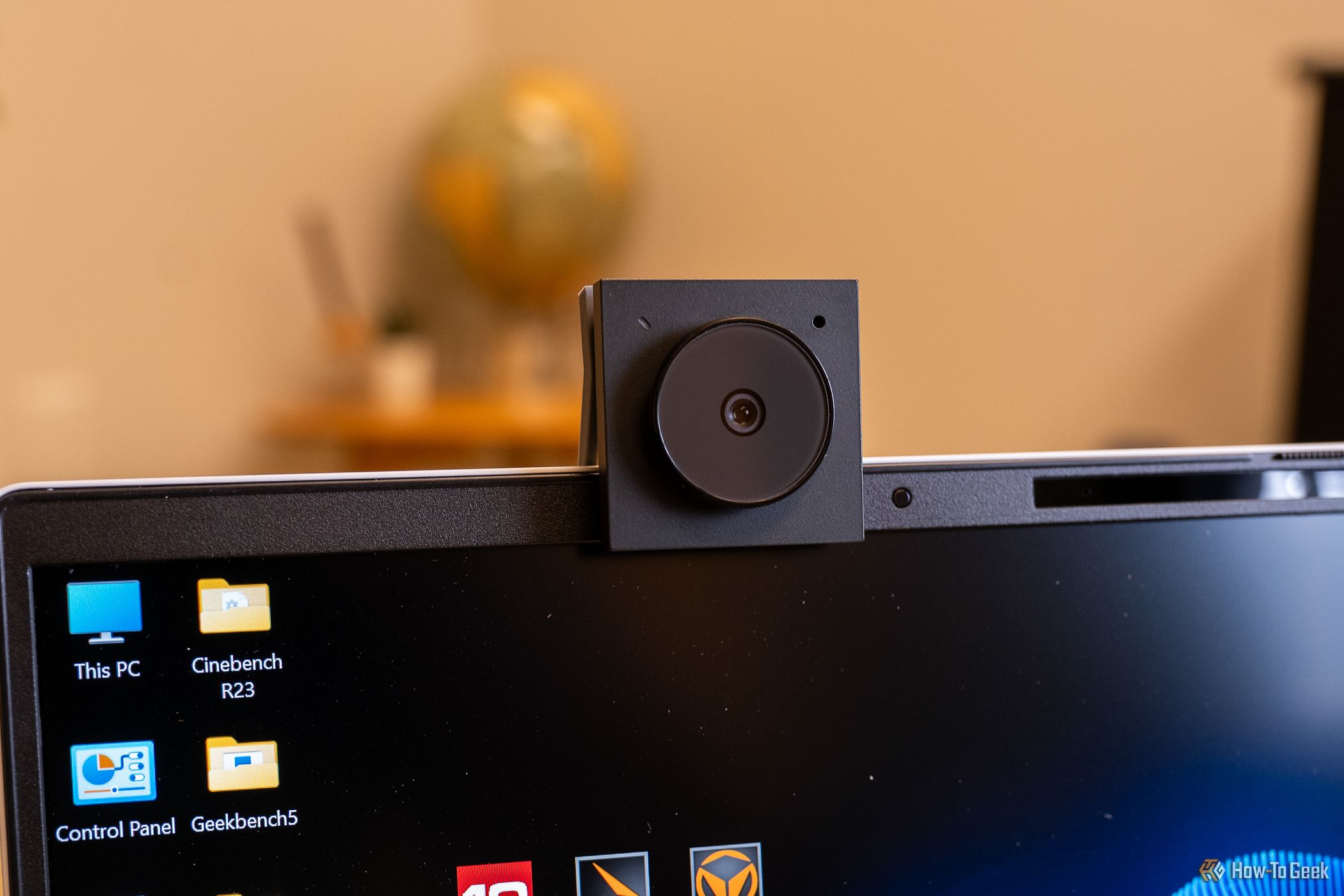 The Opal Tadpole Webcam mounted to a laptop