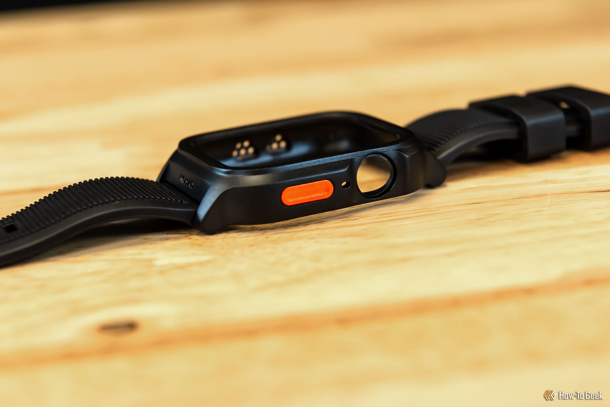 Nomad Rugged Case for Apple Watch showing Ultra Orange button.