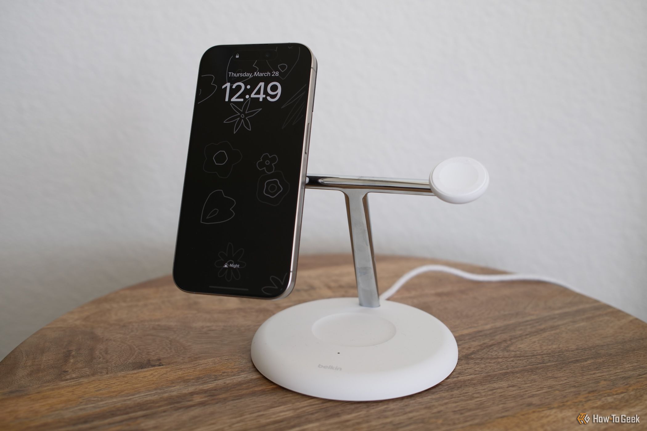 Belkin BoostCharge Pro (Qi2) with an iPhone charging vertically