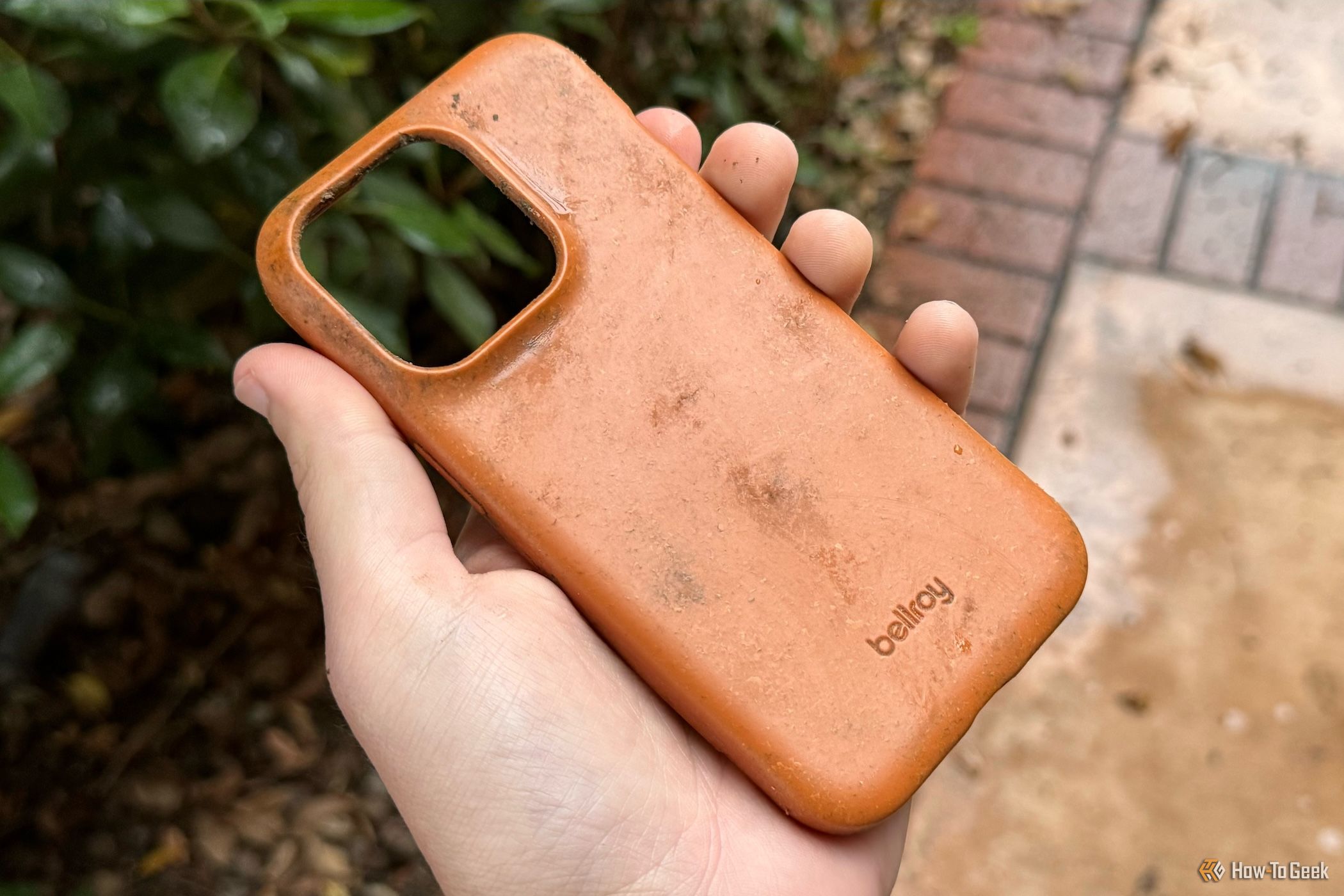 Bellroy Bio Phone Case being held by a human hand