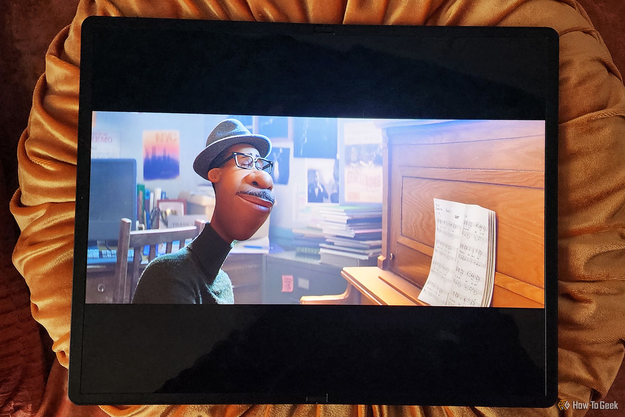 The Lenovo ThinkPad X1 Fold 16 laptop playing a movie in tablet mode.