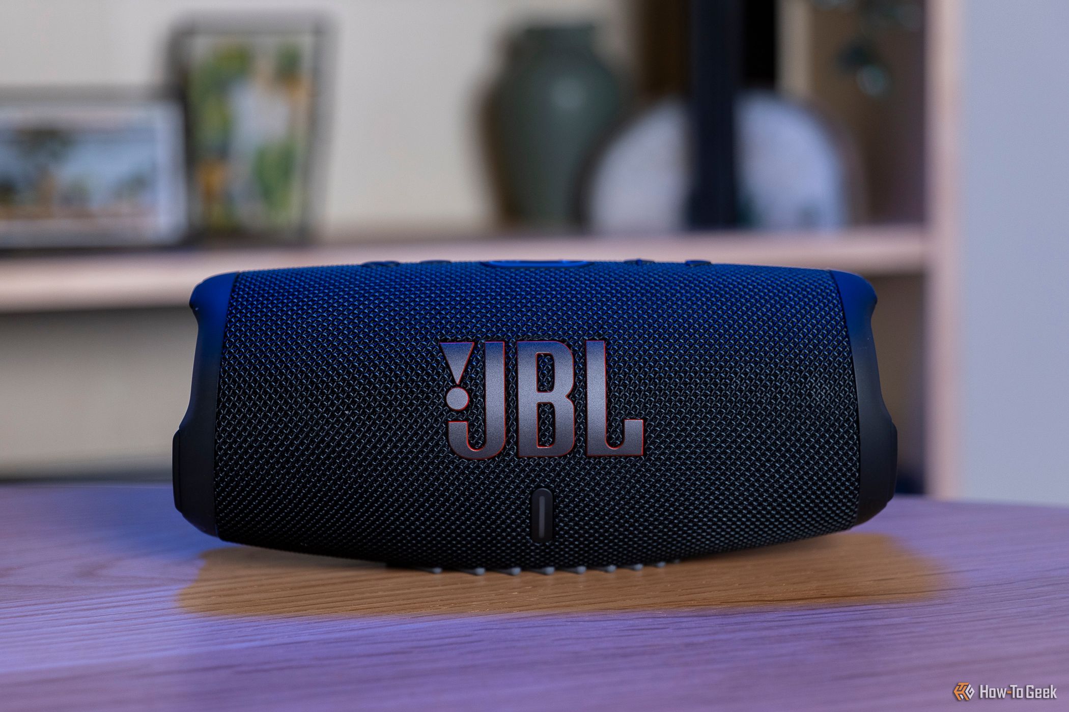 The front of the JBL Charge 5 with logo showing