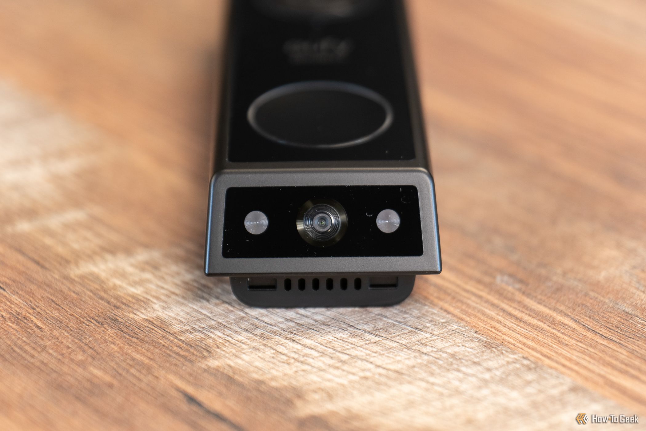 The bottom of the eufy Security E340 Video Doorbell on a table
