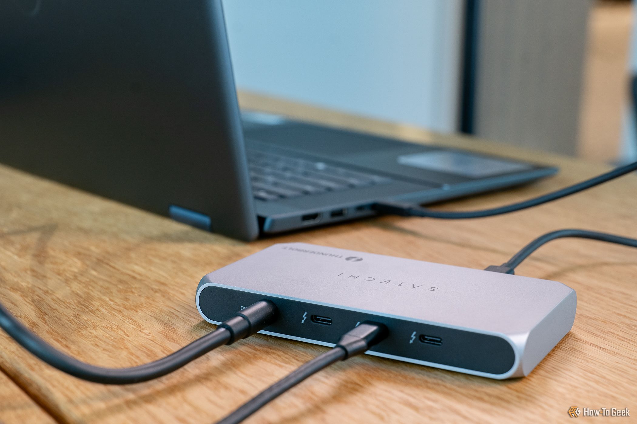 Rear view of the Satechi Thunderbolt 4 Slim Hub Pro connected to a laptop