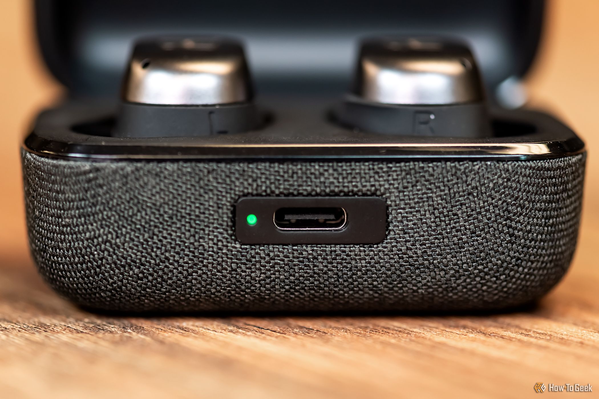 The charging port and battery indicator on the Sennheiser Momentum True Wireless 4