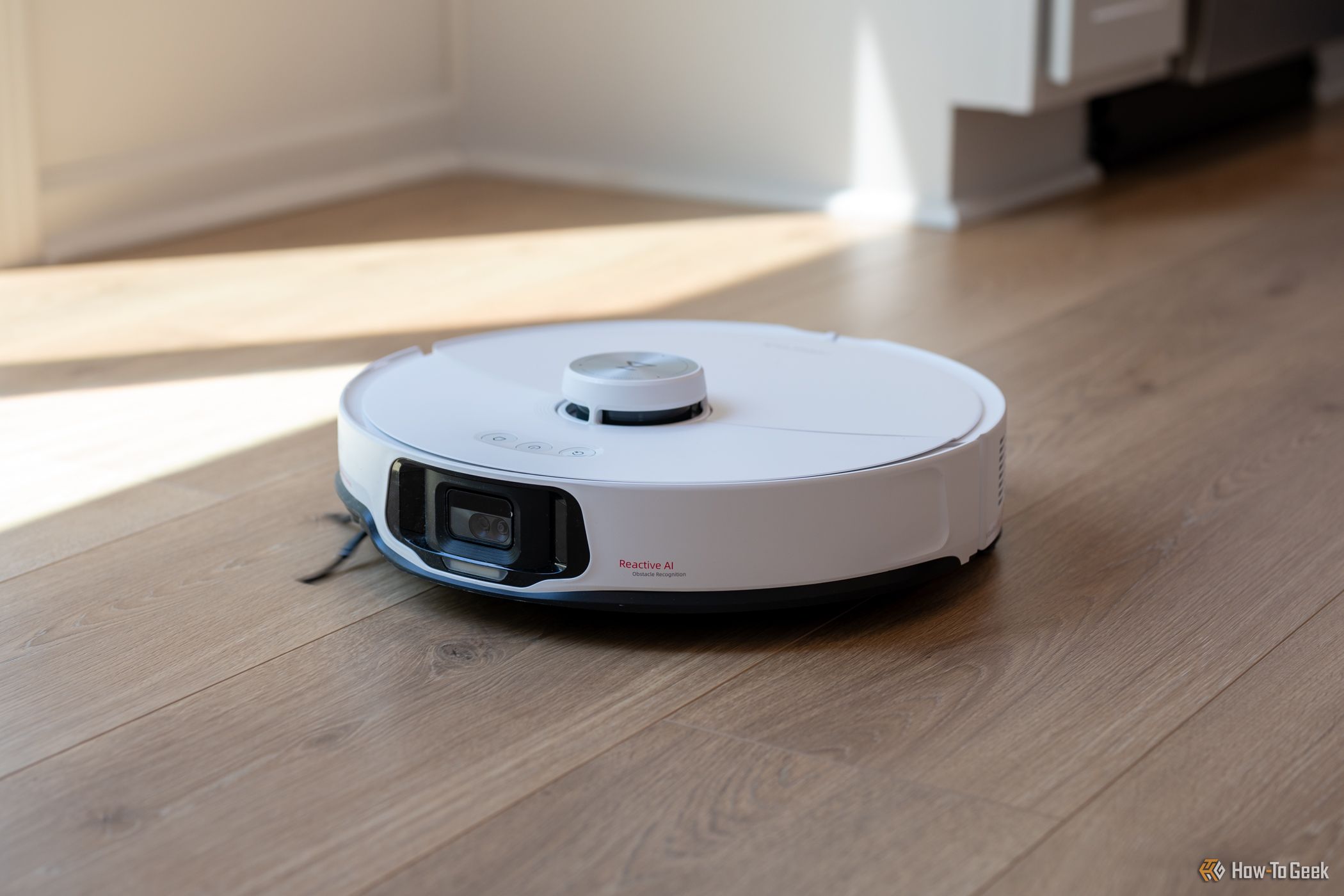 Roborock S8 MaxV Ultra mopping and vacuuming the kitchen floor