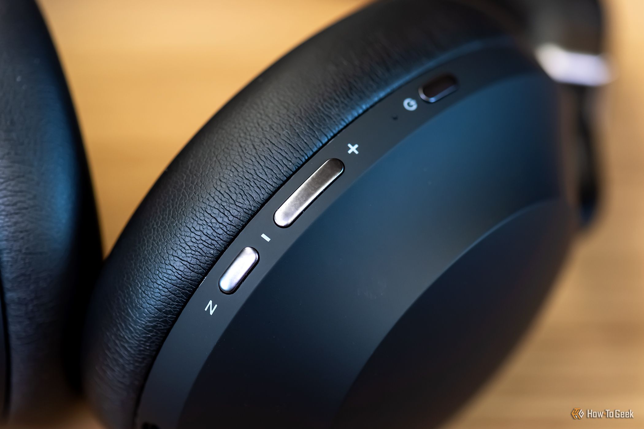 Close up of the buttons on the Raycon Everyday Headphones Pro.