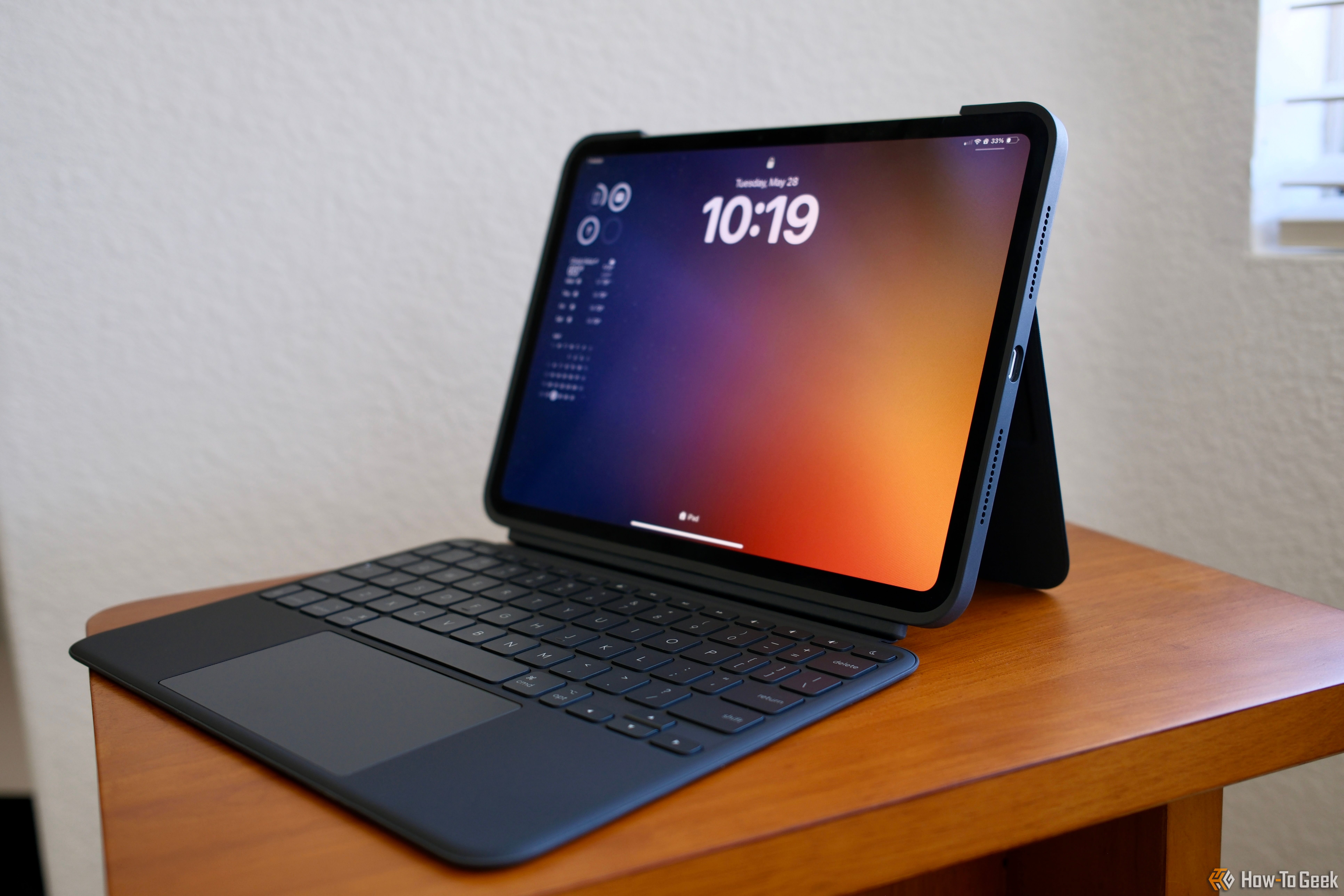 Logitech Combo Touch sitting on a a table with iPad Pro