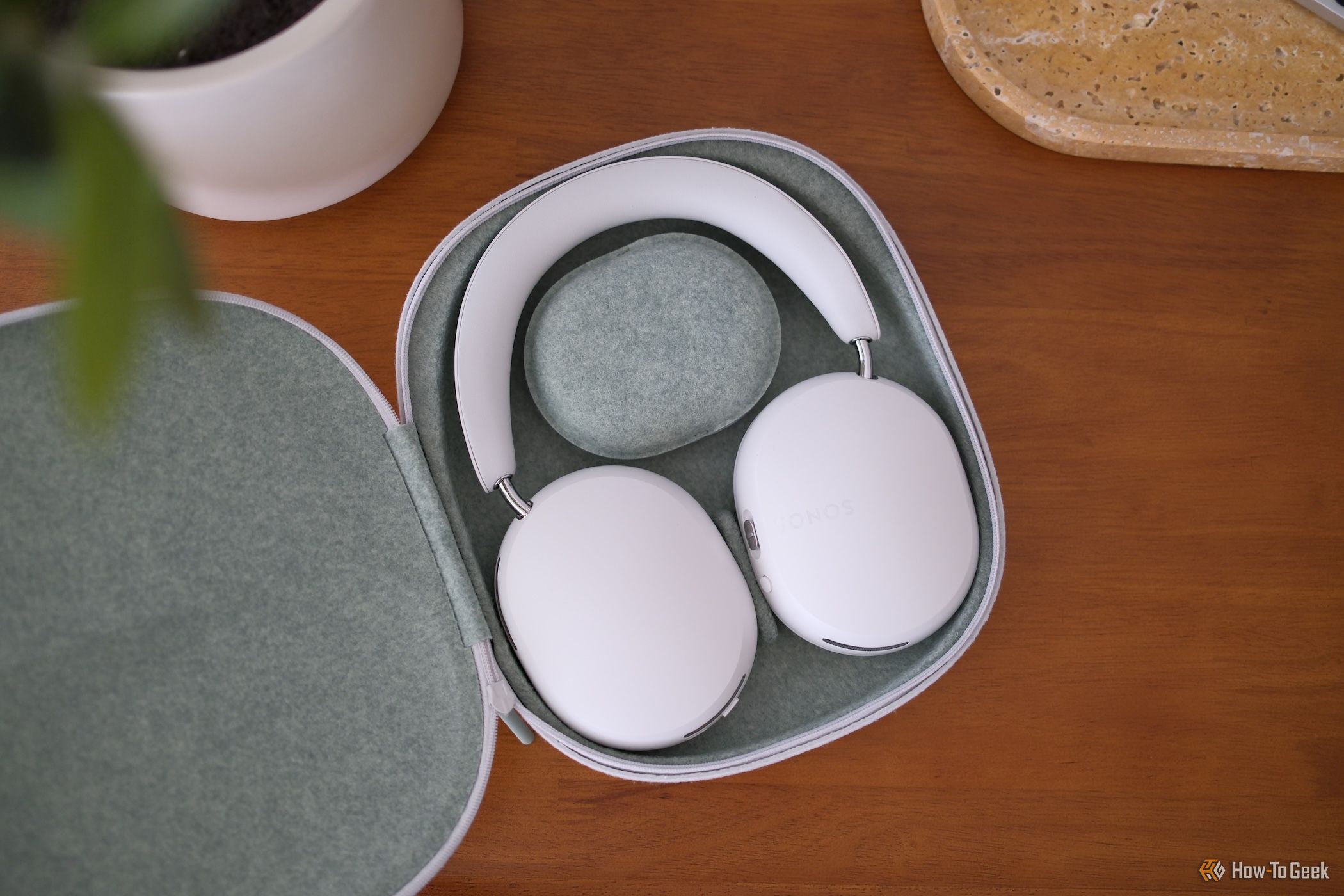 Sonos Ace in their travel case