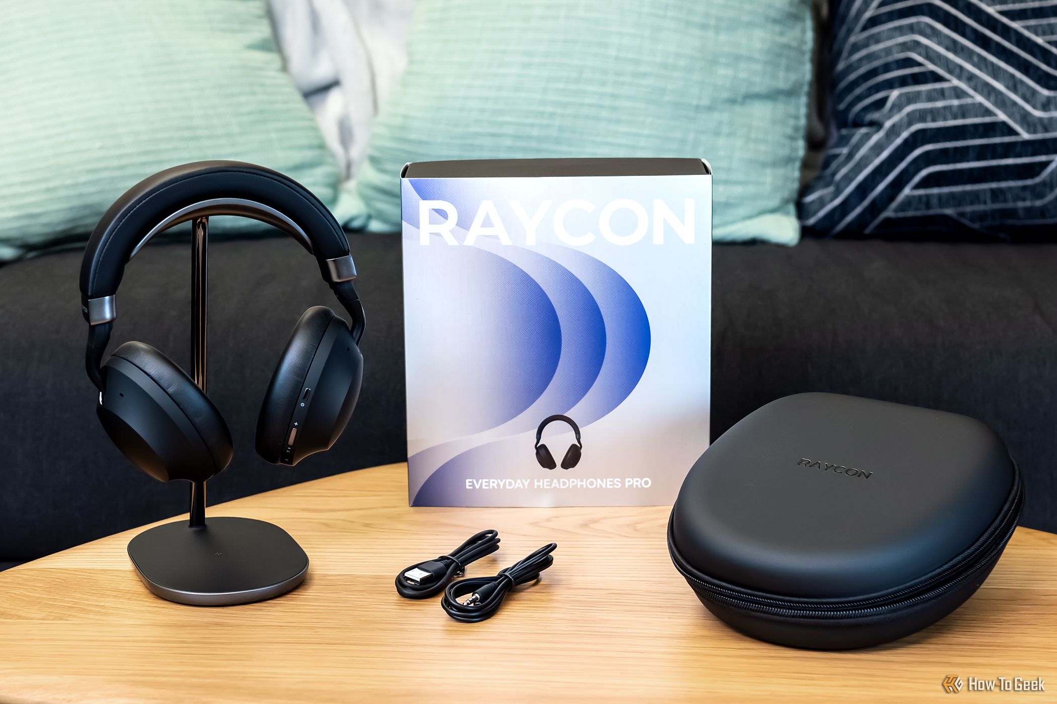 The box and case with a pair of Raycon Everyday Headphones Pro.