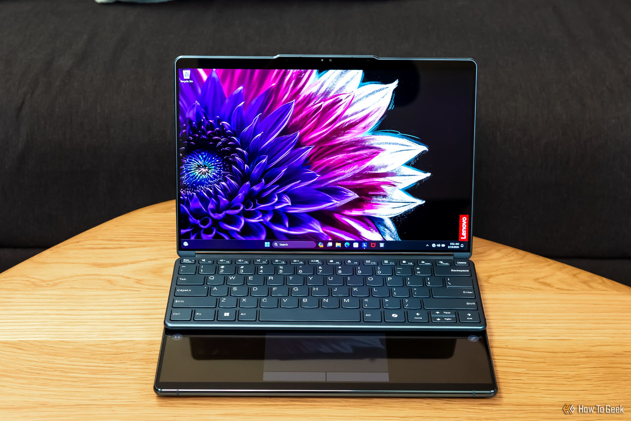 The Lenovo Yoga Book 9i with the physical keyboard and digital trackpad.