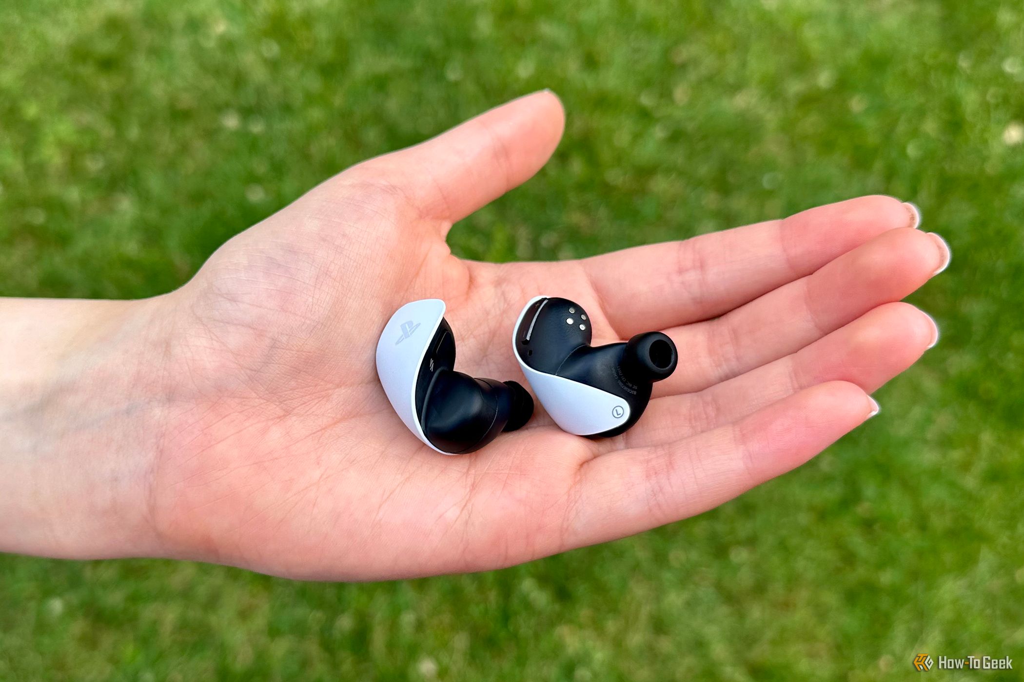 Sony Pulse Explore Wireless Earbuds in a person's hand