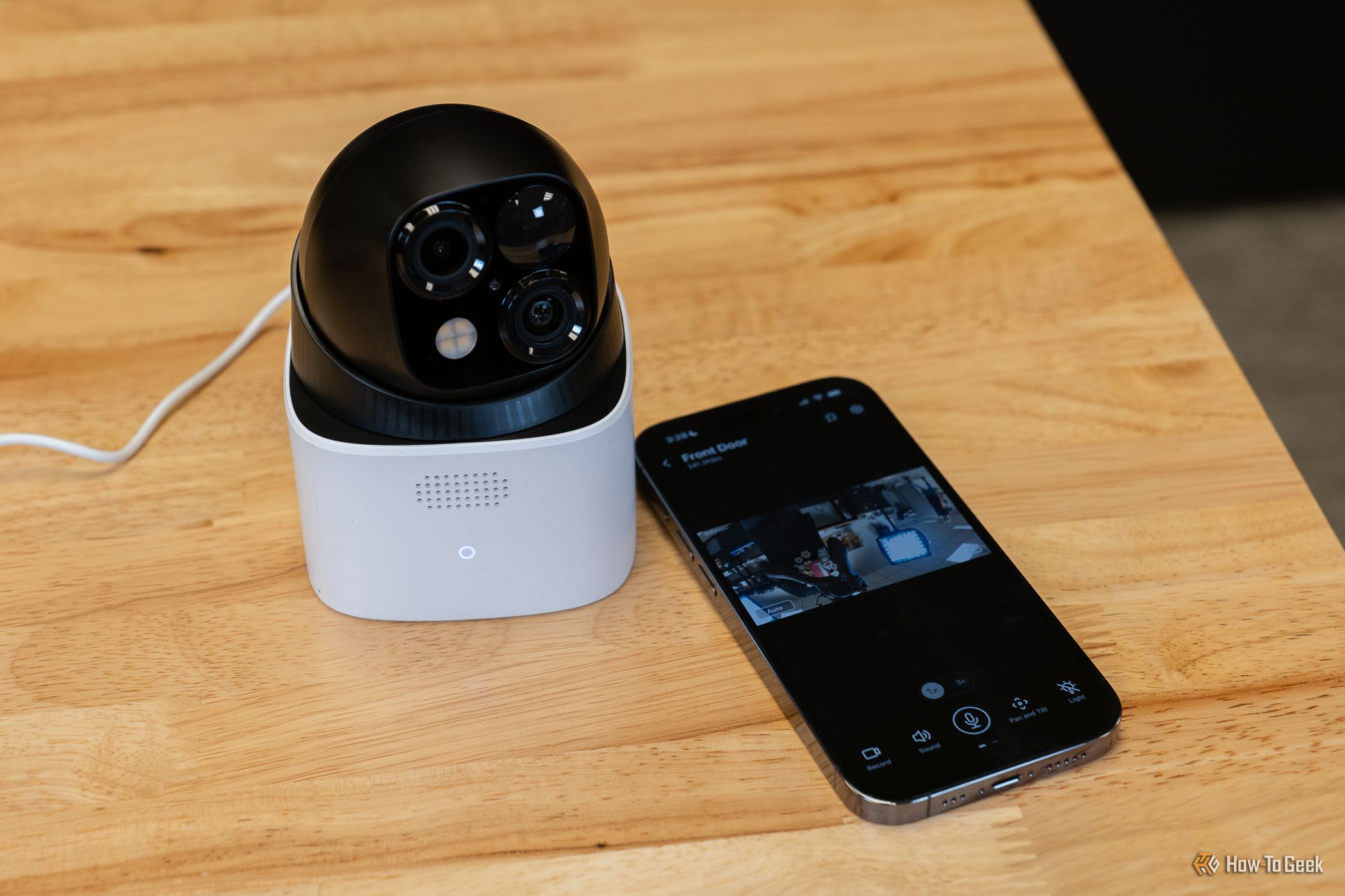 The Eufy Security SoloCam S340 connected to a smartphone via Eufy app