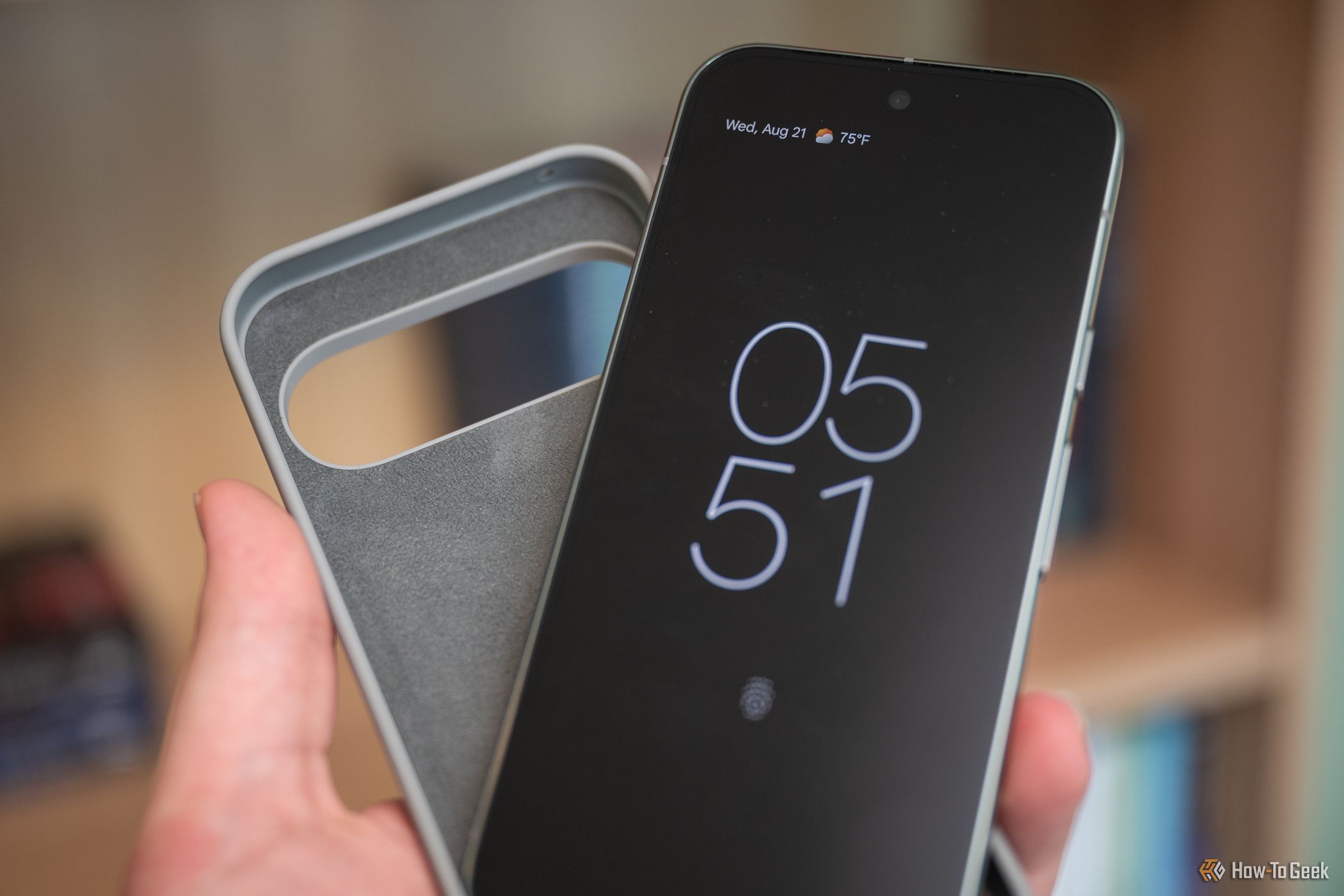 Google Pixel 9 Pro being held next to a case-1