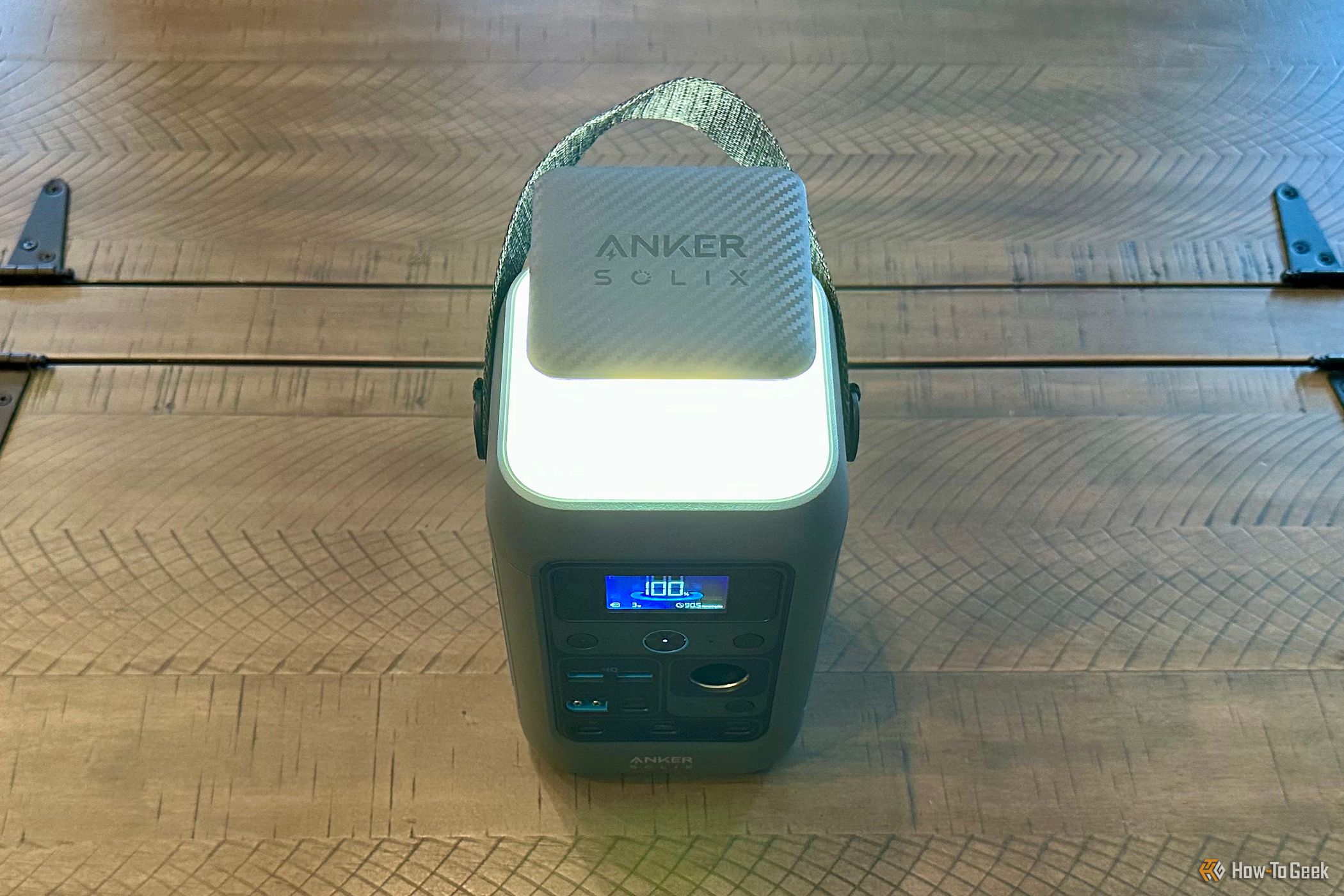 Anker SOLIX C300 DC with light on on a tabletop