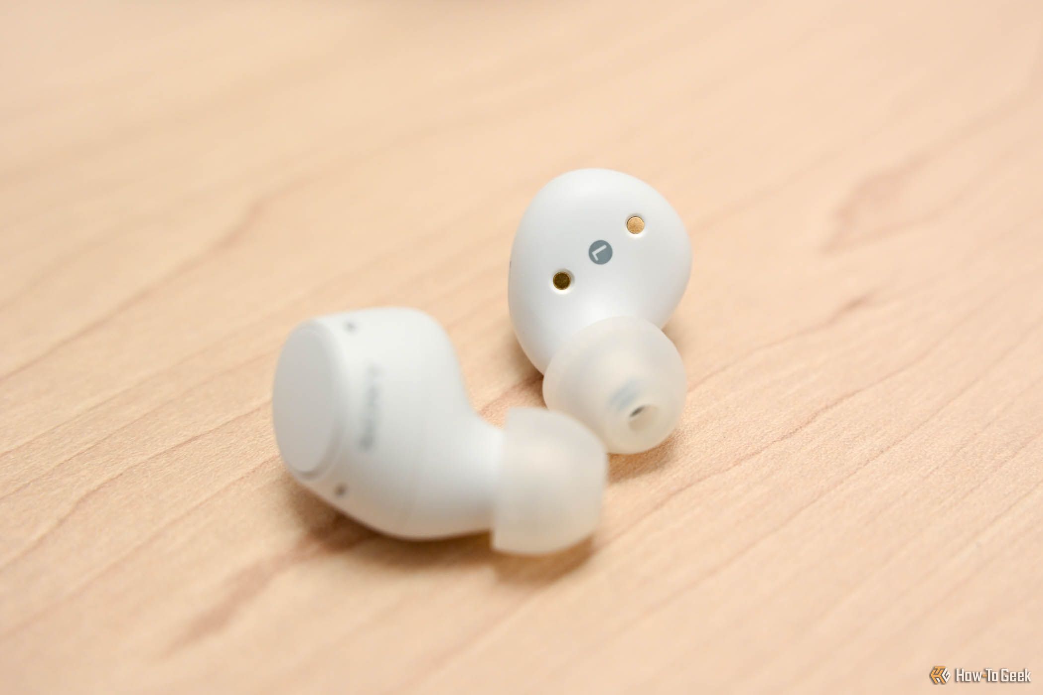 A pair of Sony WF-C510 earbuds