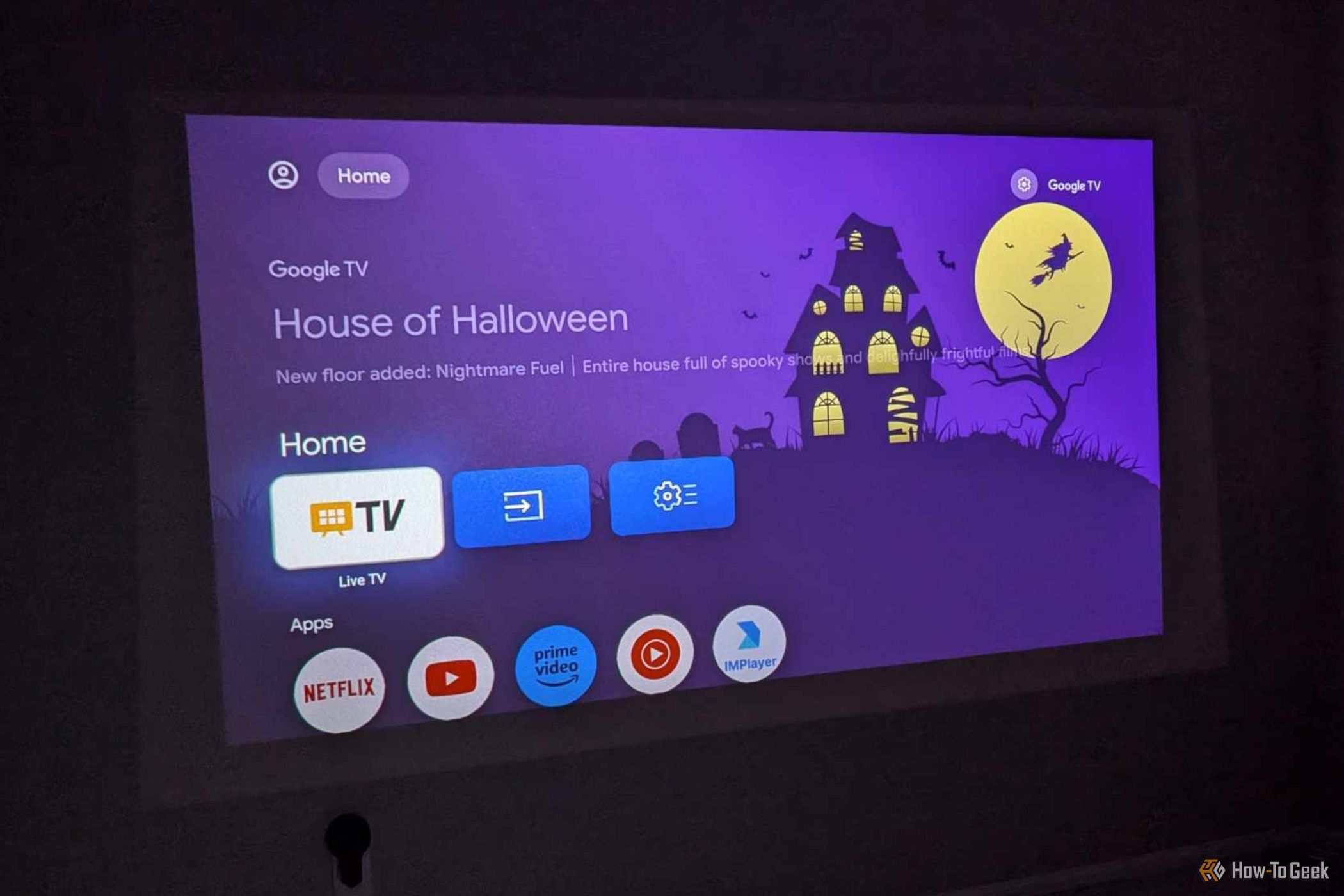 BenQ GV50 displaying Netflix, YouTube, and Amazon Prime apps on home screen.