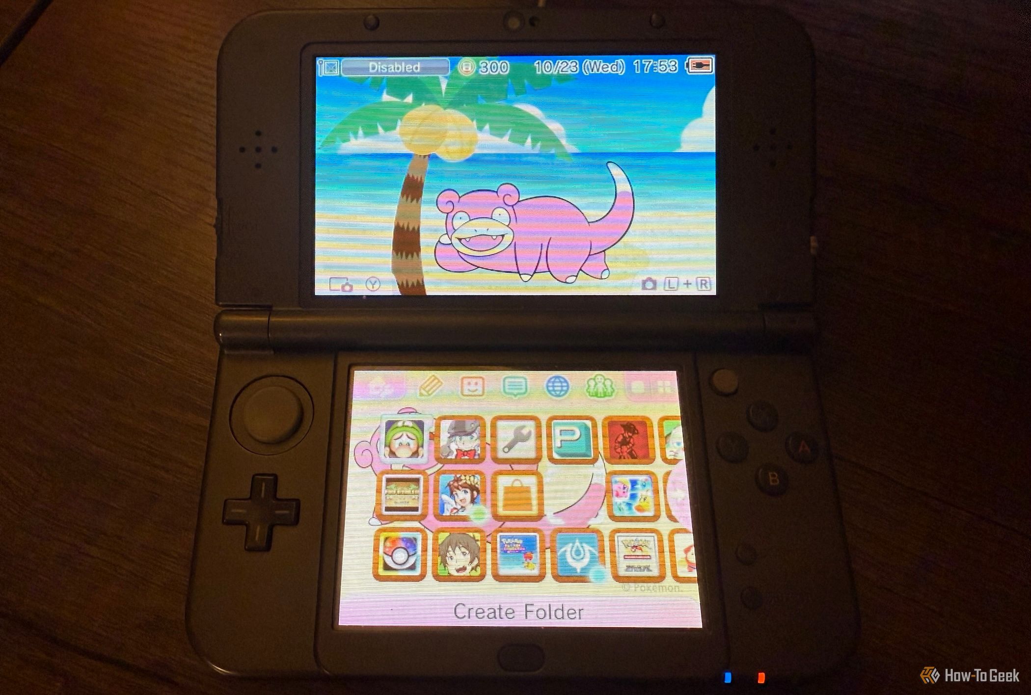 New Nintendo 3DS XL home screen with a Slowpoke theme.