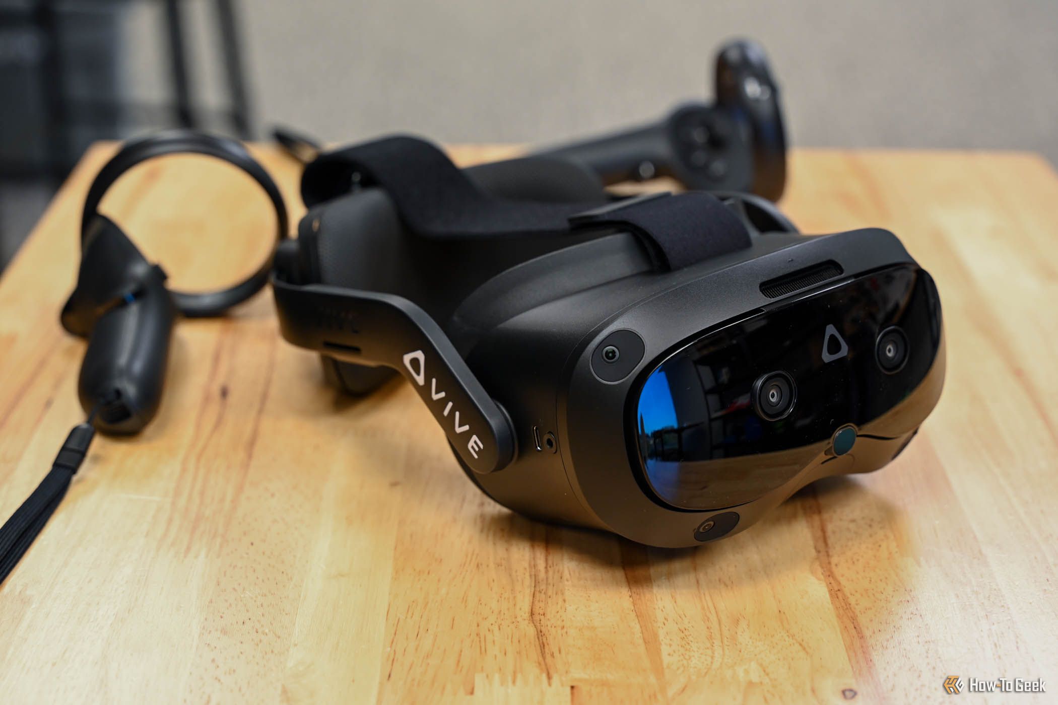 Controllers and headset of the HTC VIVE Focus Vision.