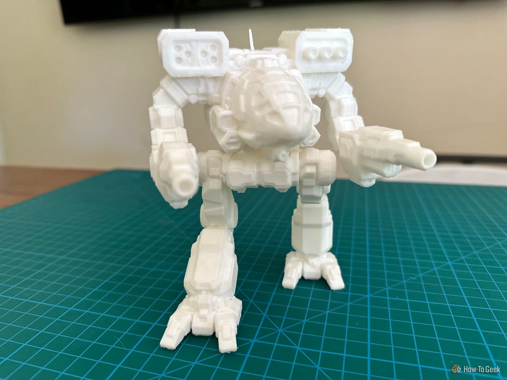 A 3D-printed model of a walker-type robot mech.