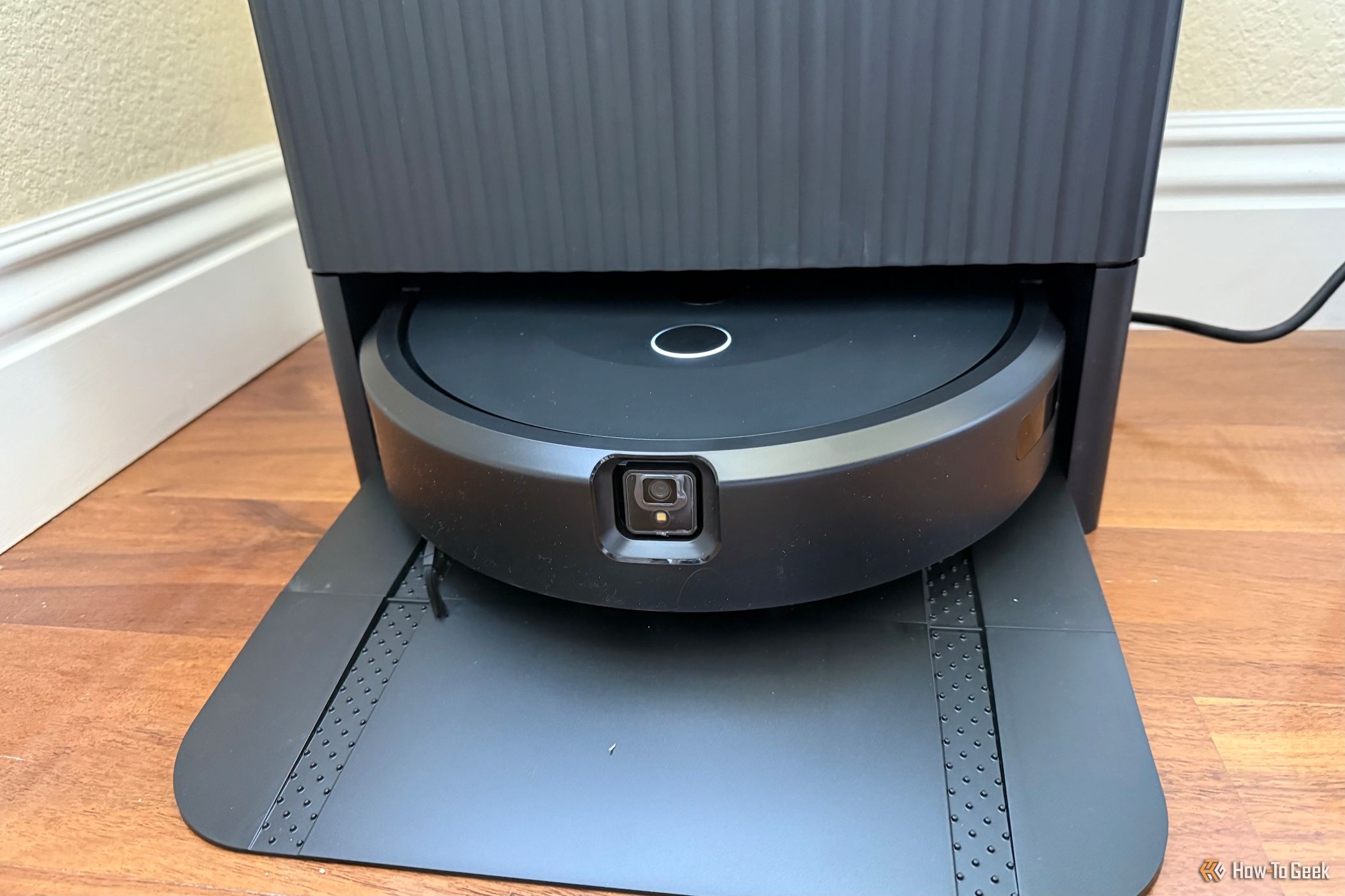 iRobot Roomba Combo 10 Max + AutoWash Dock in a dining room