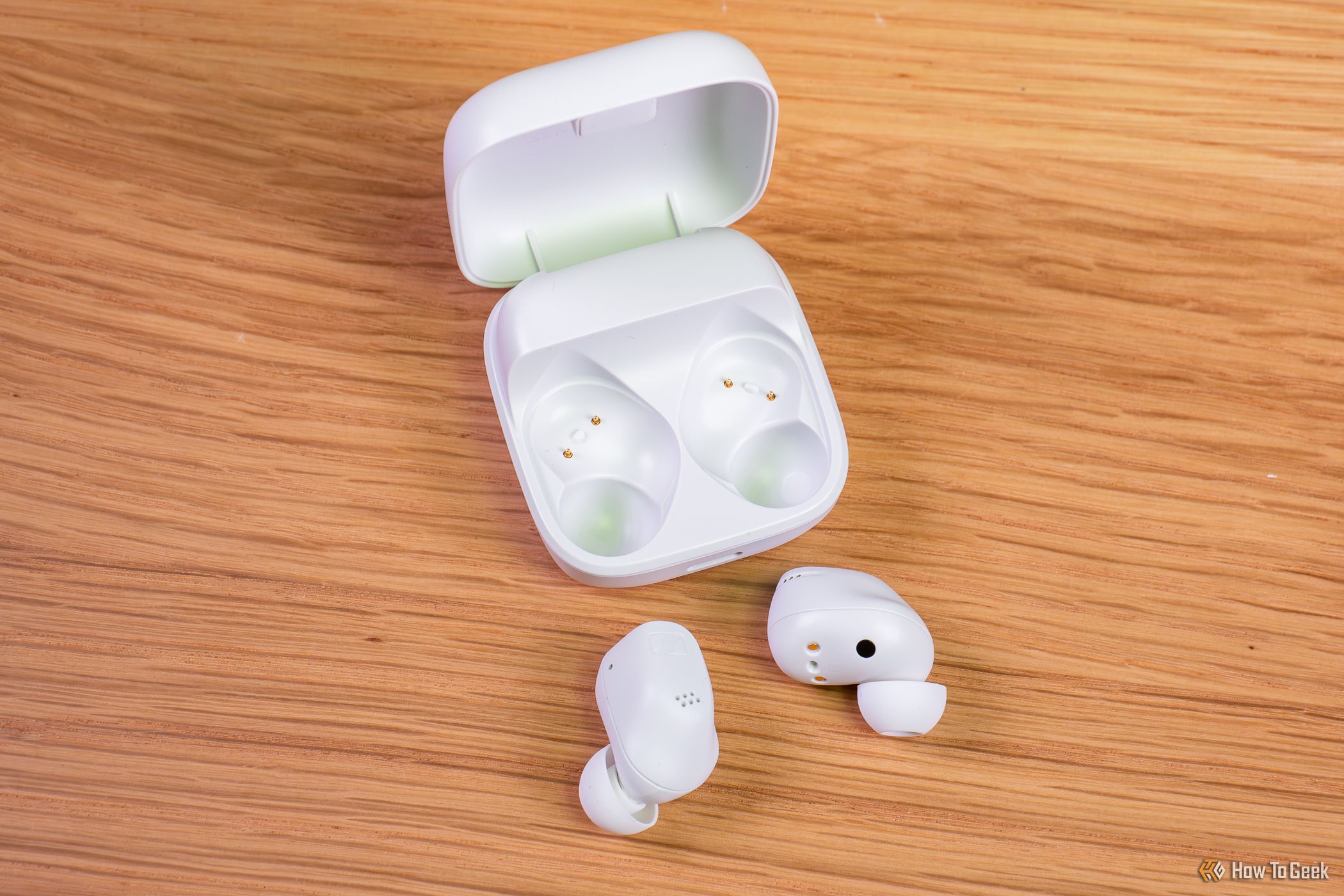 The Sennheiser Accentum True Wireless earbuds outside the case.