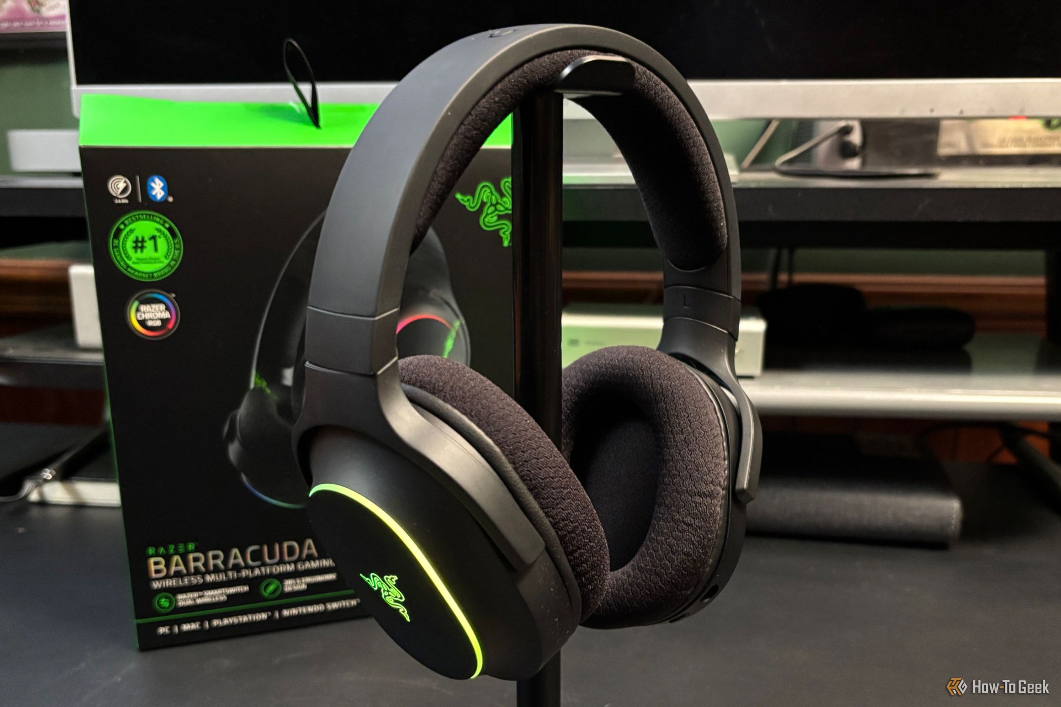 Razer Barracuda X Chroma on a headphone stand, no microphone attached.