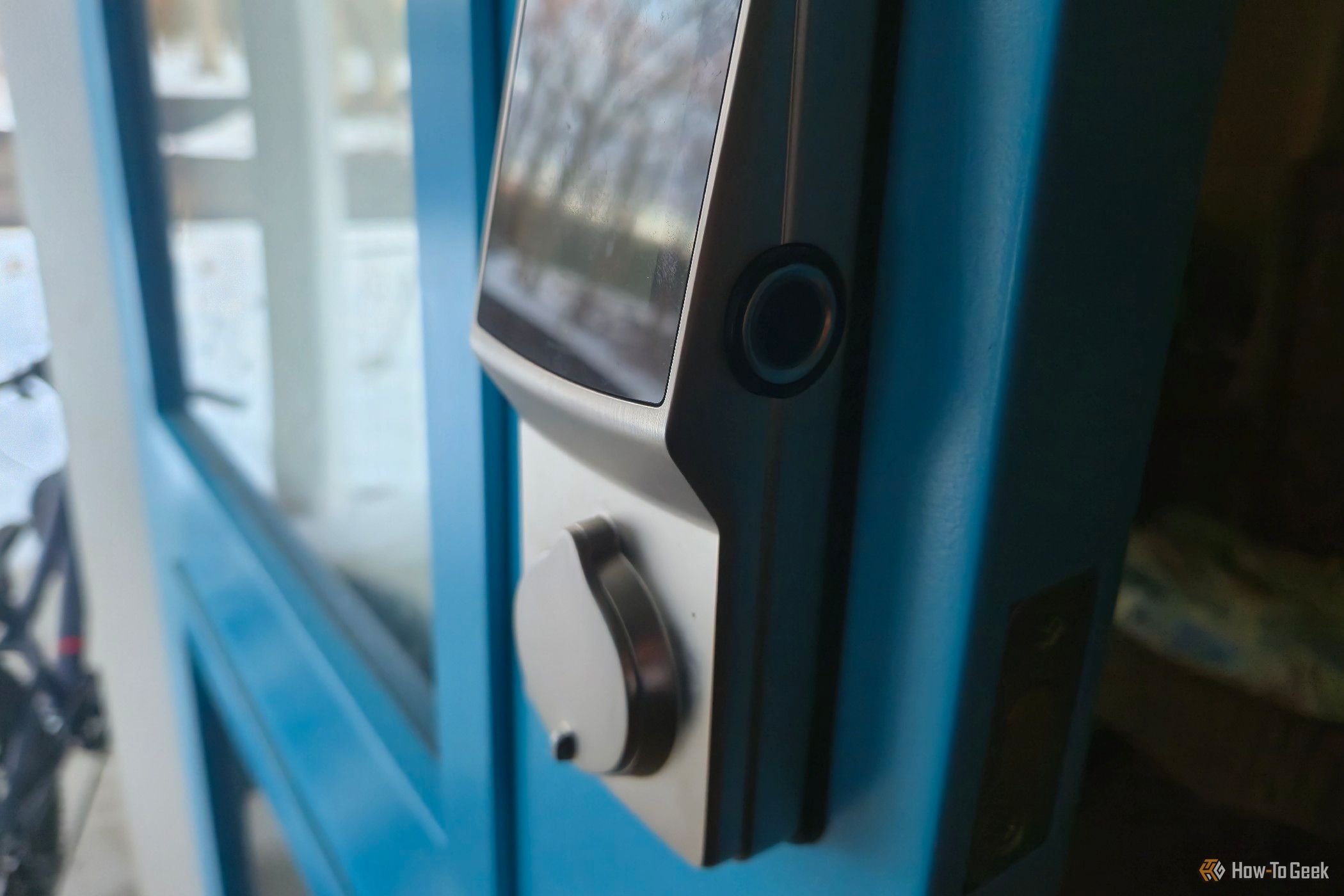 The fingerprint reader on a Lockly smart lock.