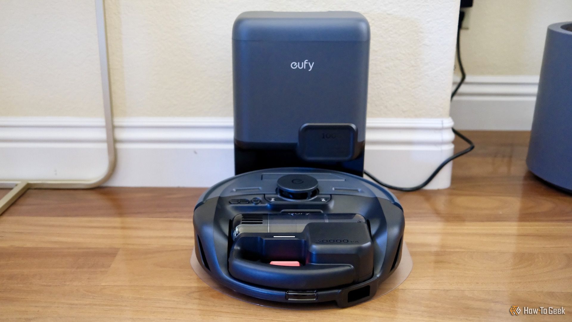 Eufy 3-in-1 E20 charging in its docking station.