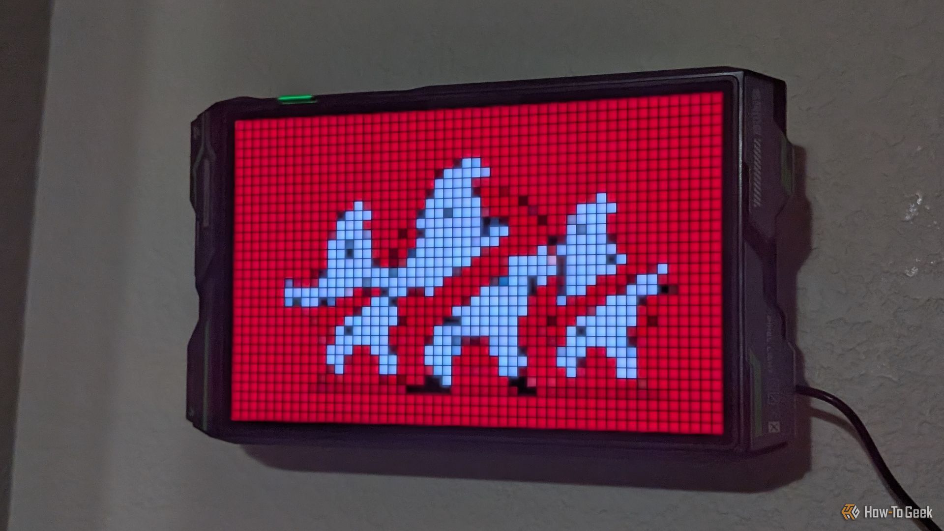 Govee Gaming Pixel Light showing unique Ghostbusters logo.