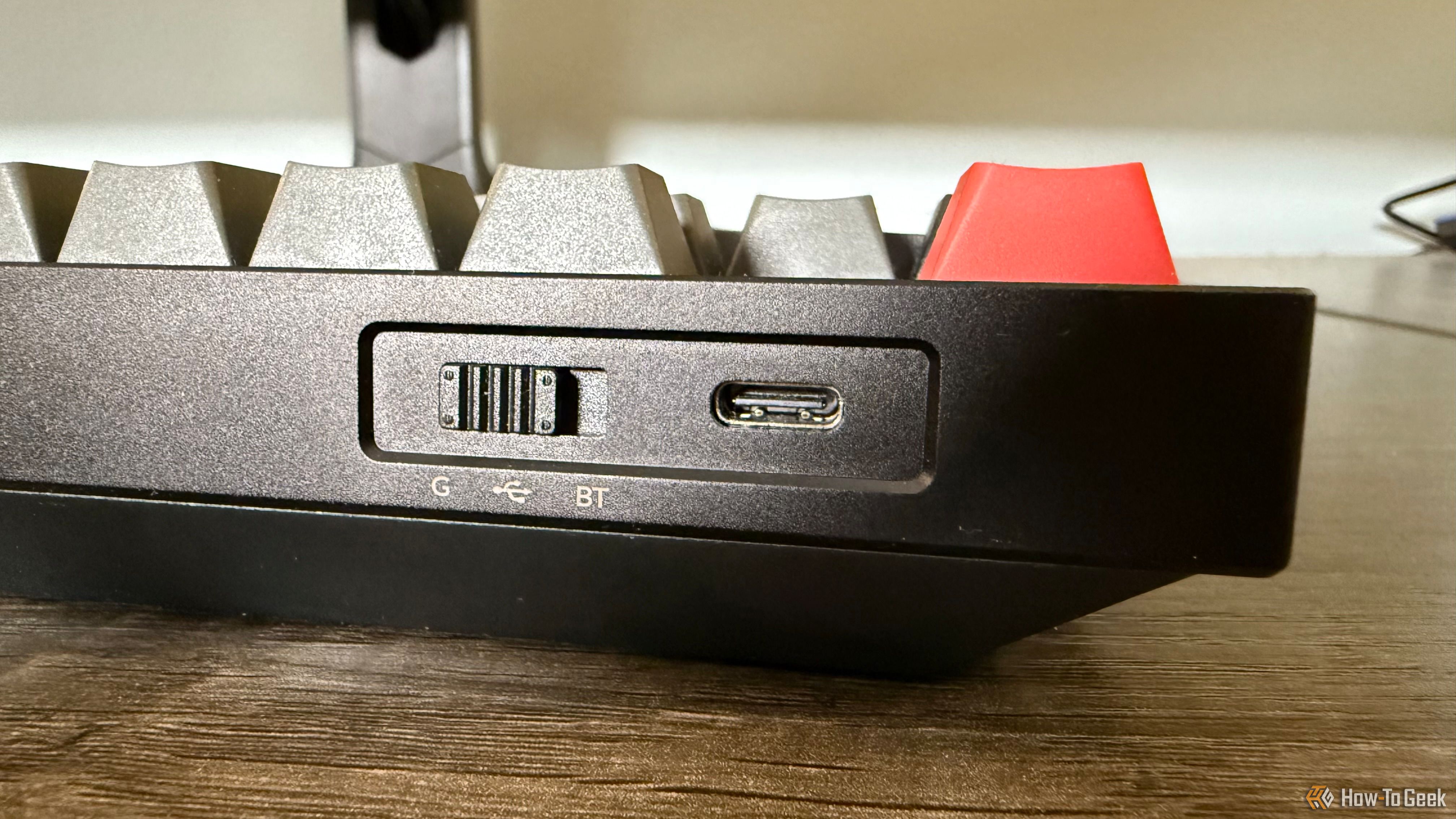 Connectivity mode switch and USB-C port on the back of the Keychron Lemokey L4.