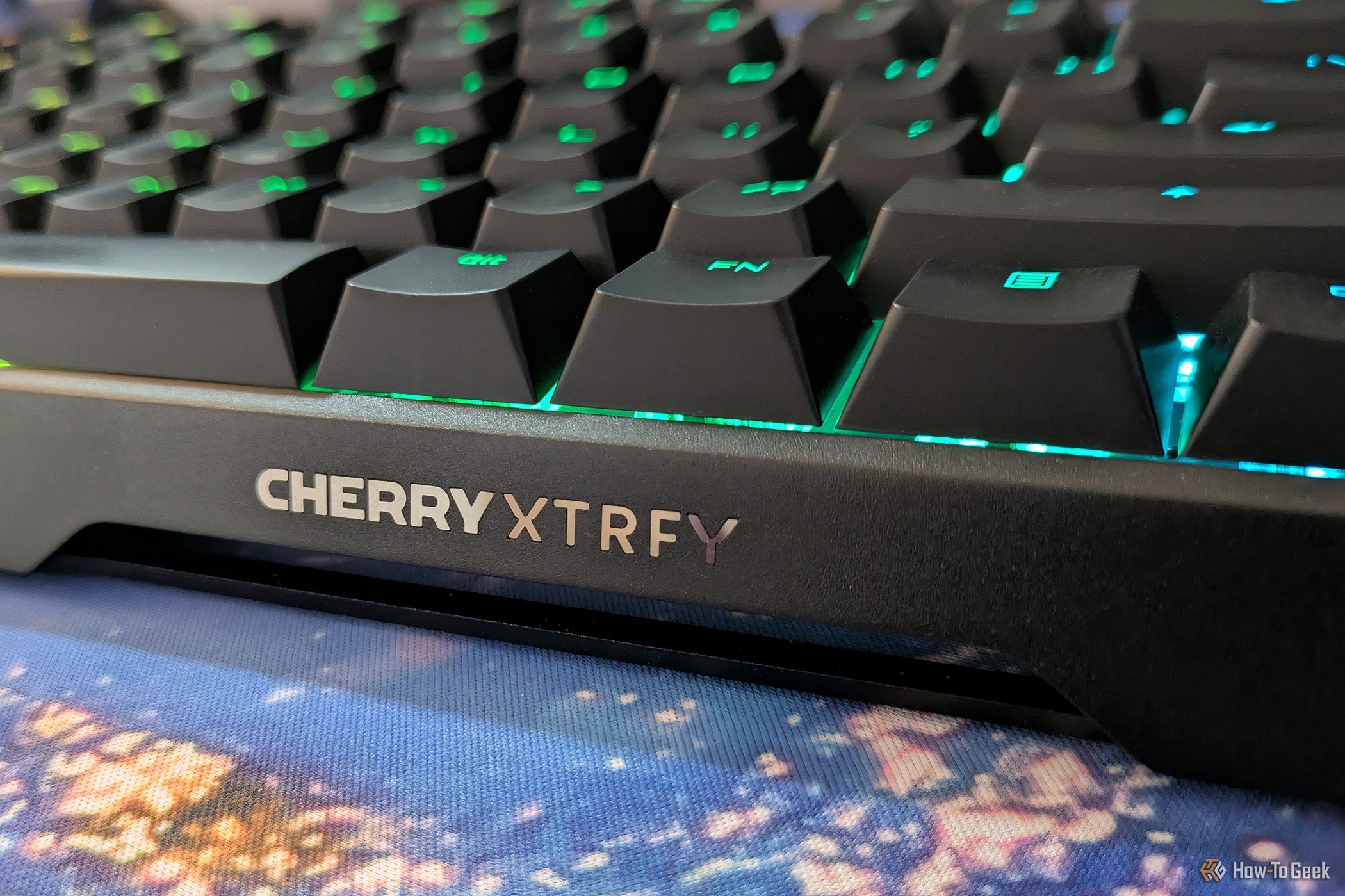 Close up of CHERRY XTRFY logo on side of the keyboard