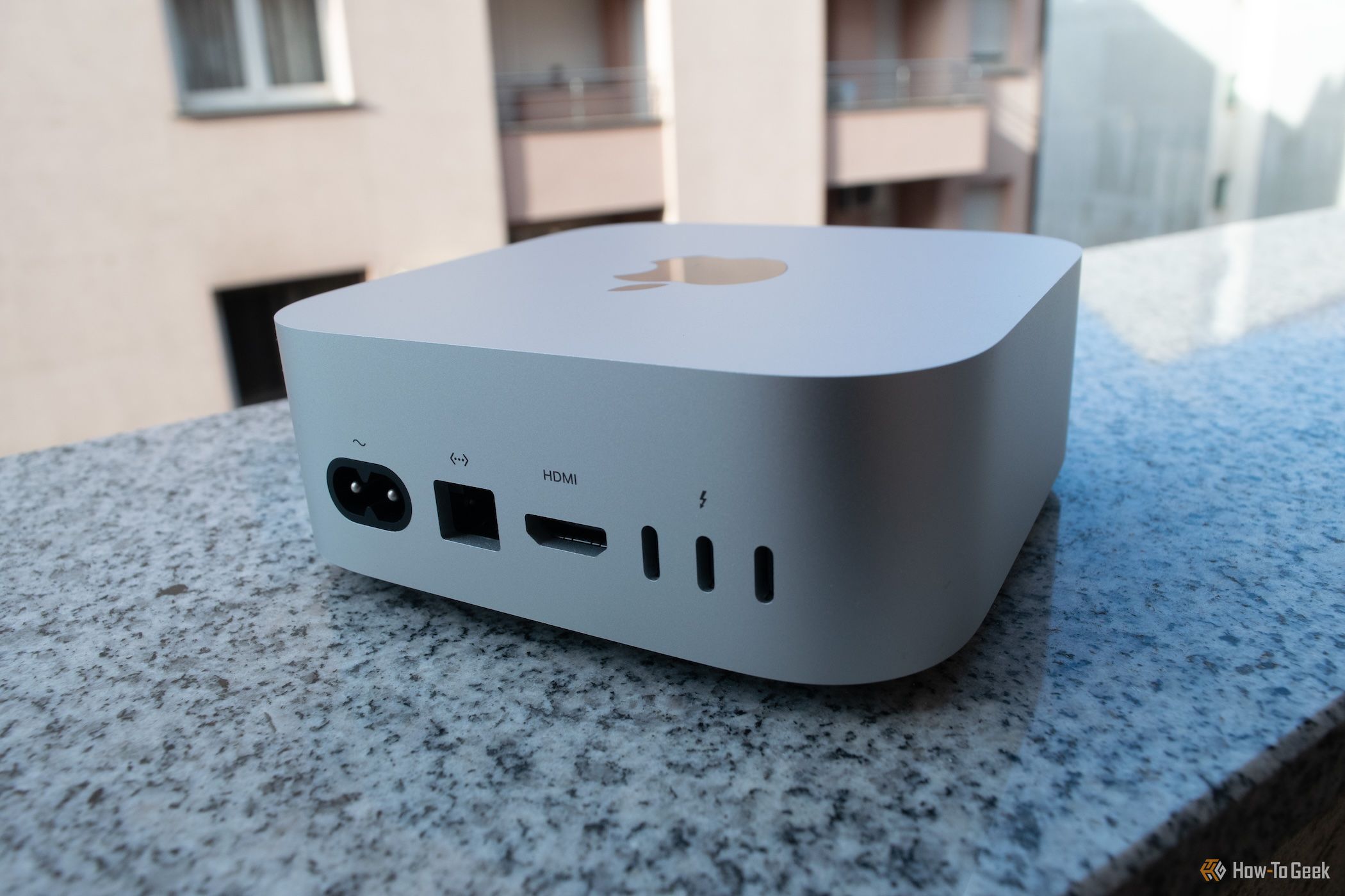 Rear side of an M4 Mac Mini with the ports in the foreground. 